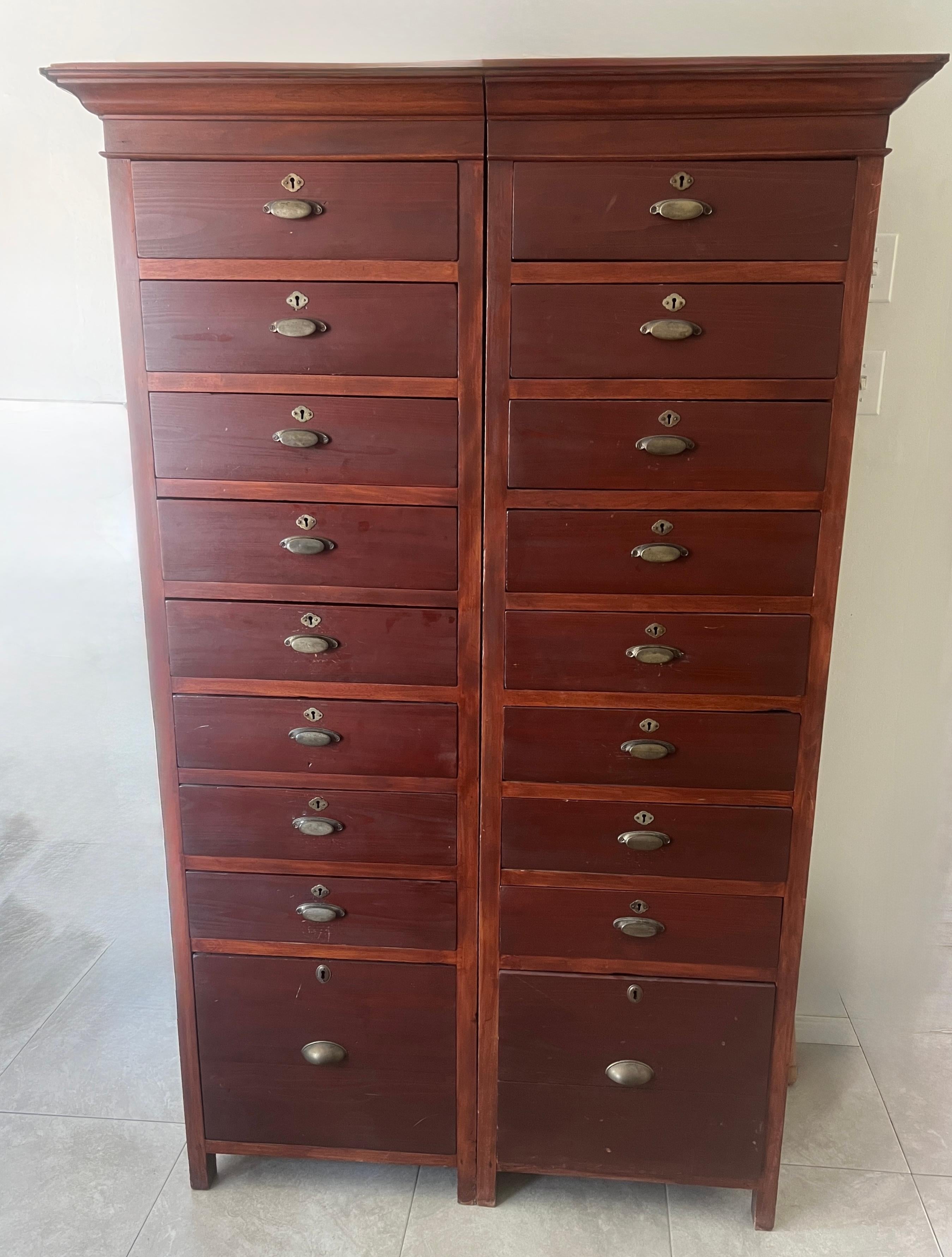 This pair of 1940s French notary cabinets embodies both versatility and timeless character. Whether arranged as a single unified piece or as two separate corner cabinets, they adapt seamlessly to a variety of spaces. Originally housed in a Parisian