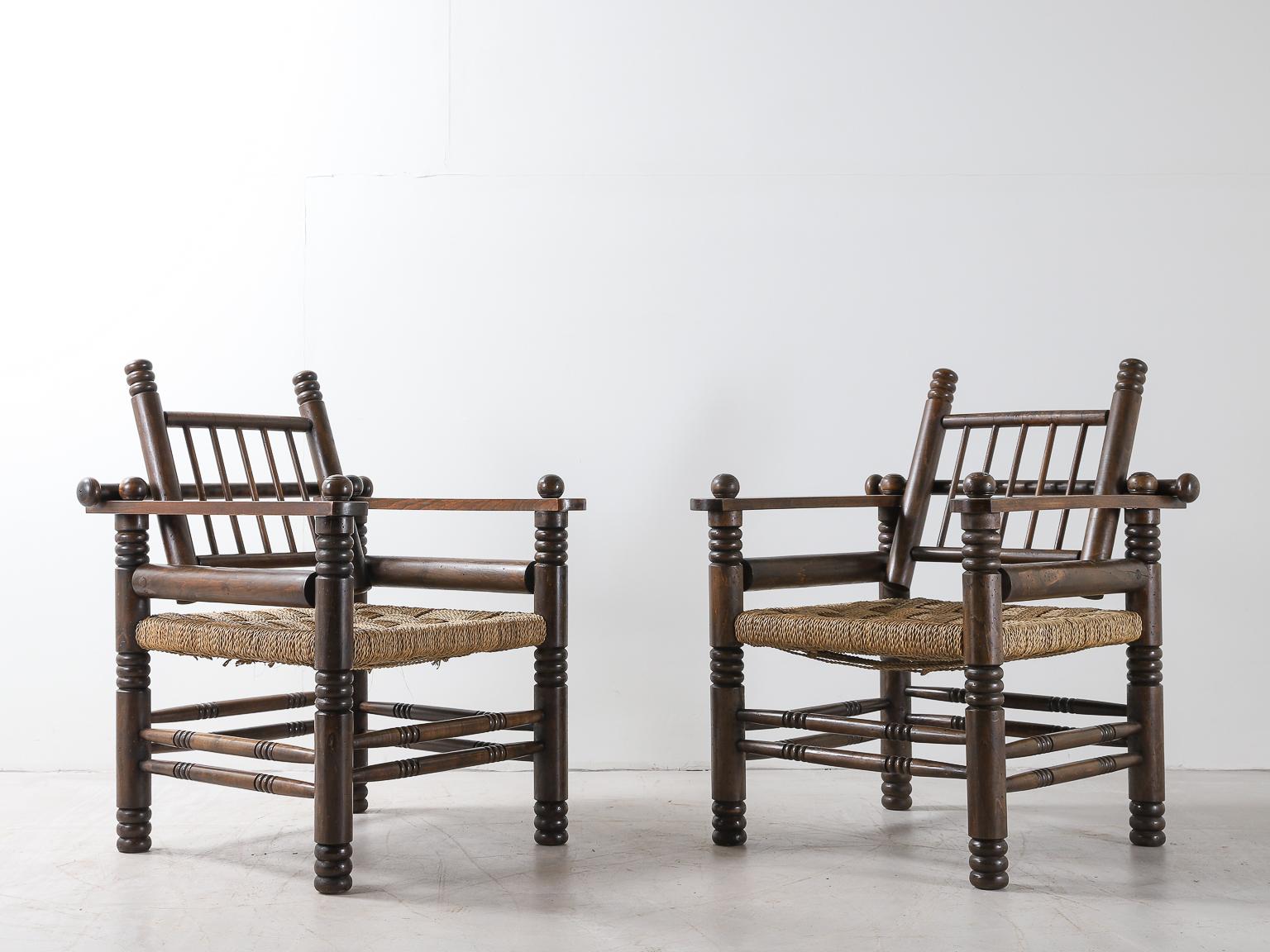 Turned Pair of French Oak and Papercord Chairs by Charles Dudouyt For Sale