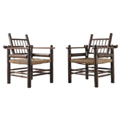 Pair of French Oak and Papercord Chairs by Charles Dudouyt