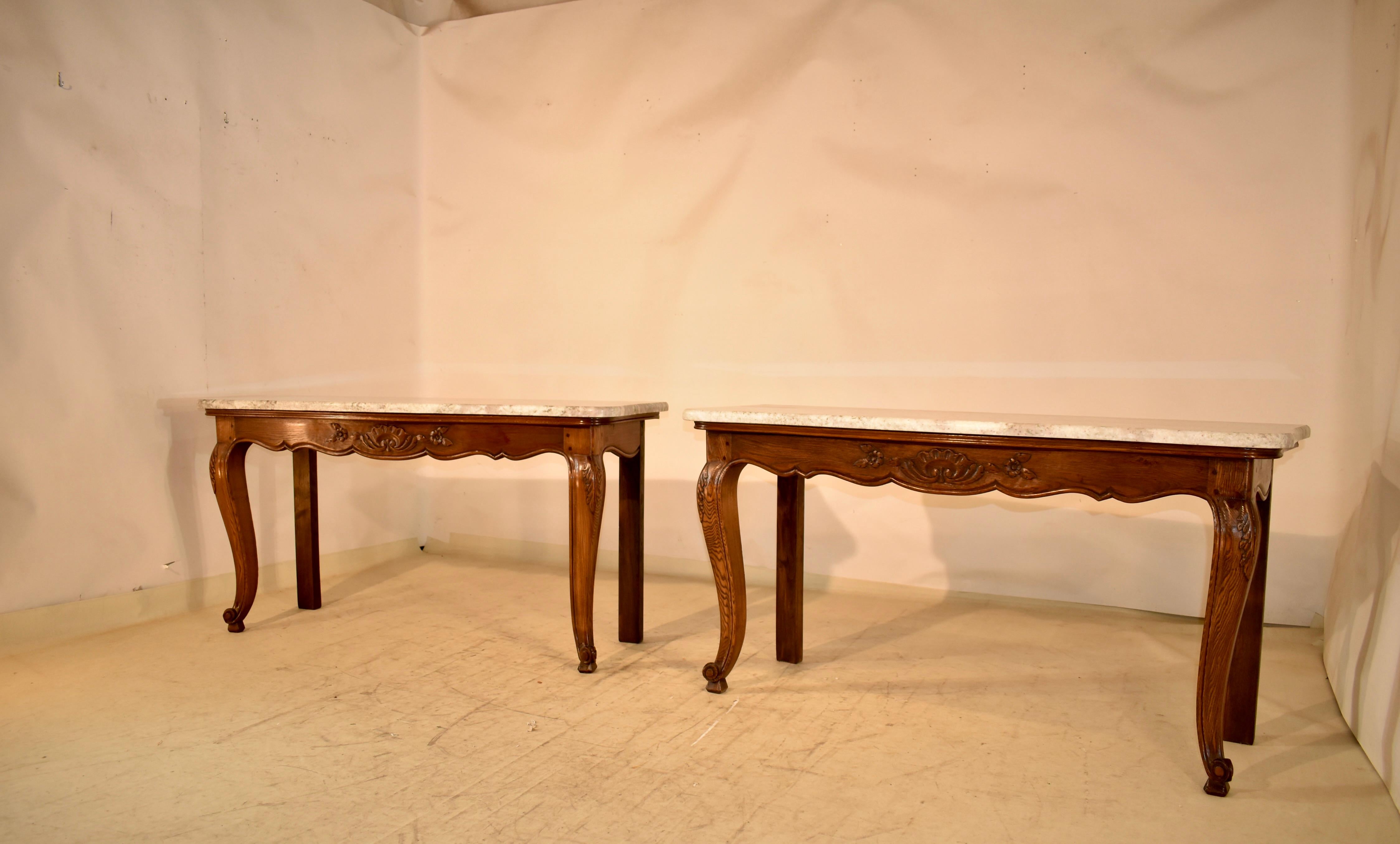 Hand-Carved Pair of French Oak Consoles with Marble Tops, Circa 1900 For Sale