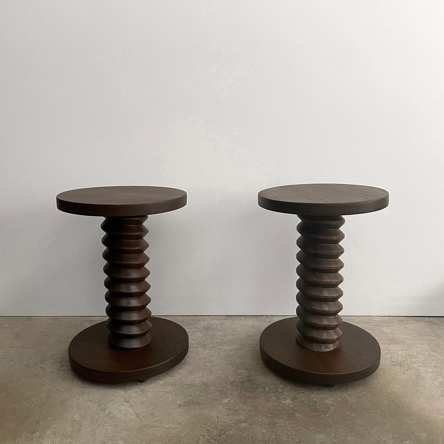 Pair of French Oak Corkscrew End Tables
France, mid century 
Hand crafted artisanal piece
Impressive slab wood tabletop is over 1” thick
Beautifully sculpted turned wood corkscrew pedestal
Lovely wood grain detail
Natural color variations throughout