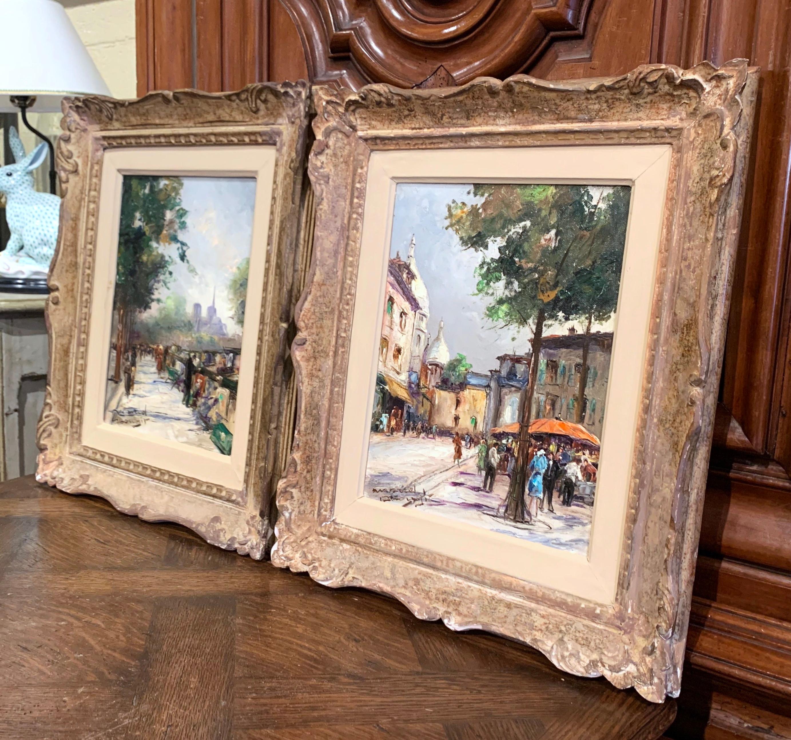 These colorful antique oil on canvas paintings were created in France, circa 1930. Set in the original ornate and carved frames, both compositions depict typical Parisian streets filled with people, and two iconic landmarks in the background; 