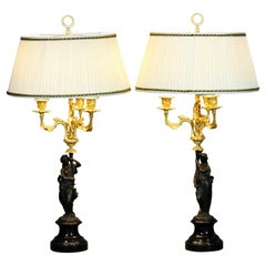 Pair of French Ormolu and Patinated Bronze Caryatid Lamps