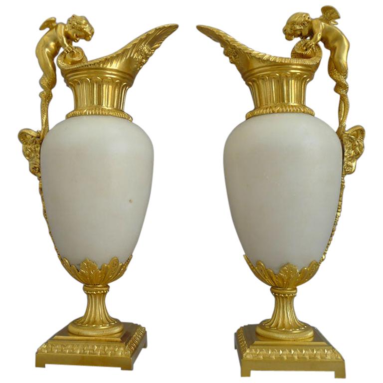 Pair of French Ormolu and White Marble Decorative Ewers of Outstanding