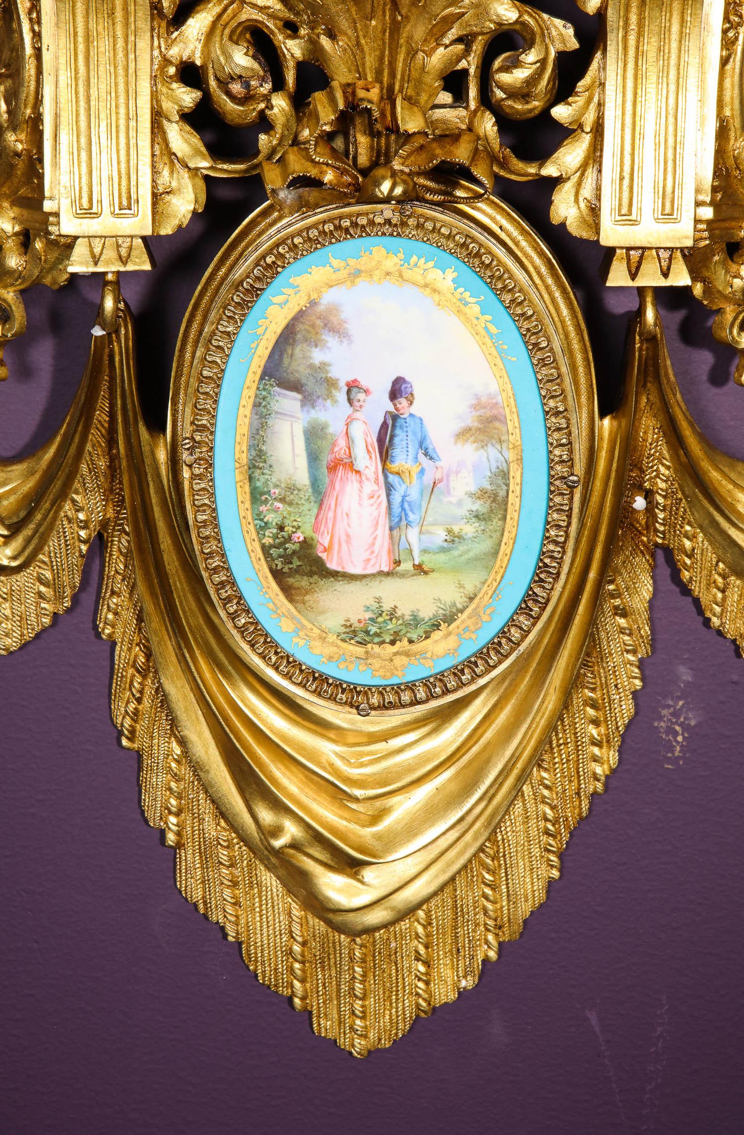 An exceptional pair of French ormolu bronze and turquoise Sèvres Porcelain wall brackets appliques, circa 1880

Very high quality bronze, very solid.
 
Each with partial gilt and polychrome decorated oval Sèvres- porcelain plaques of courtship