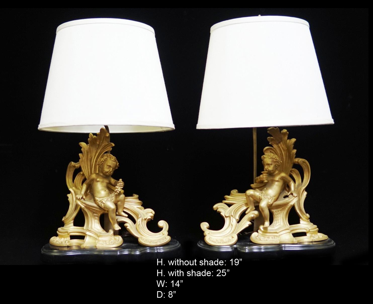 Pair of French Ormolu gilt bronze chenet mounted lamps. Each chenet is acanthus decorated with putti, raised on conforming stepped base. Electrified. 
Shades not included.

Dimensions: 
H. with shade 25
