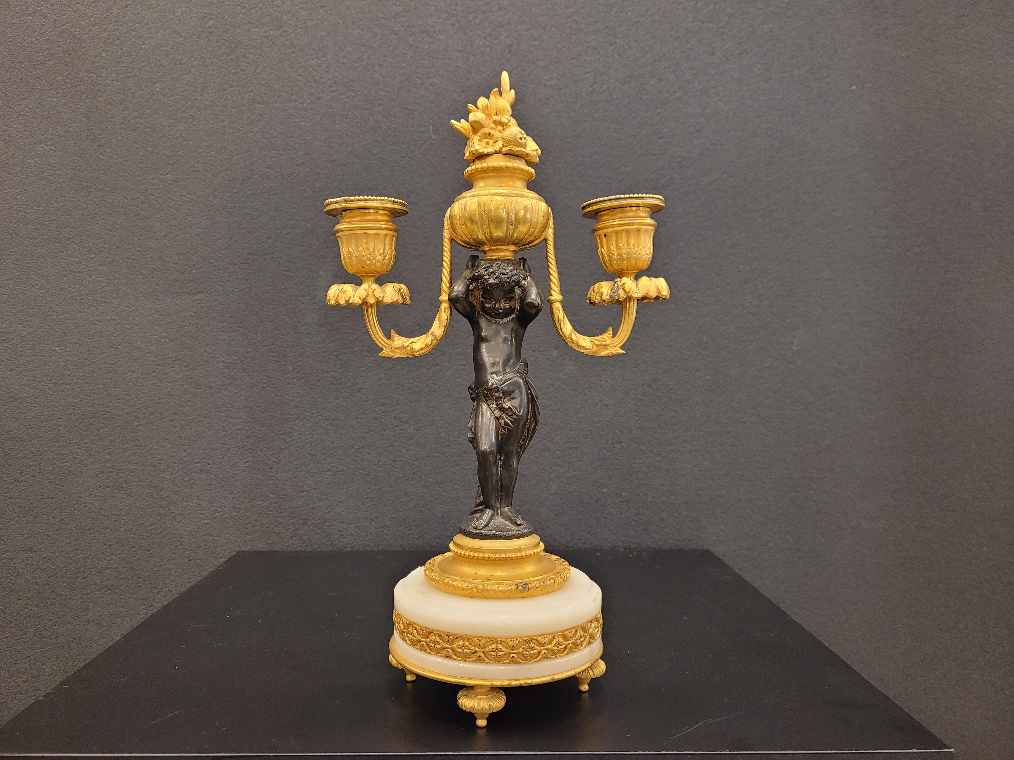Bronze Pair of  French Ormolu  marble bronze candlesticks gilt bronze putti For Sale