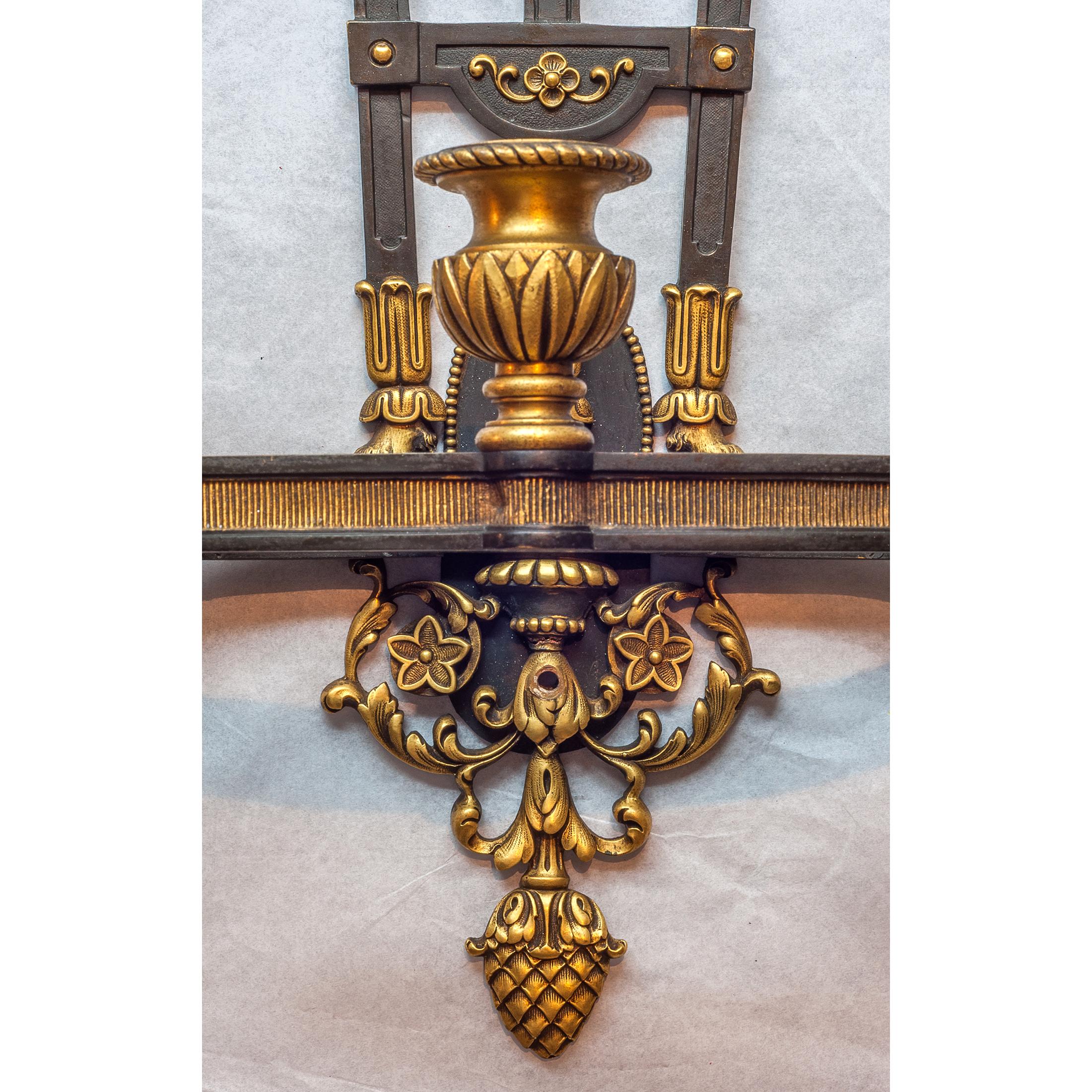 Gilt Pair of French Ormolu Three-Light Wall Sconces For Sale