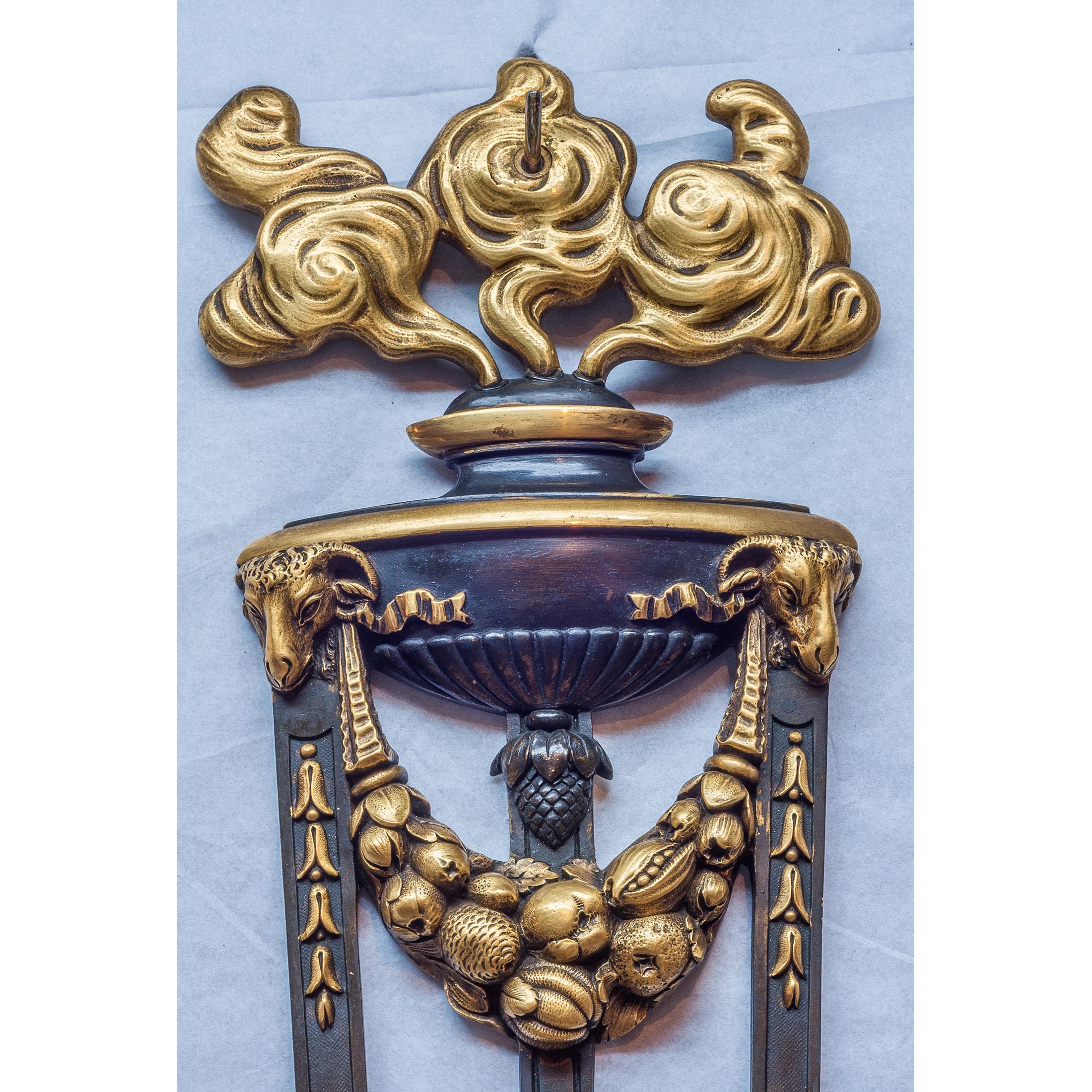 Pair of French Ormolu Three-Light Wall Sconces In Excellent Condition For Sale In New York, NY