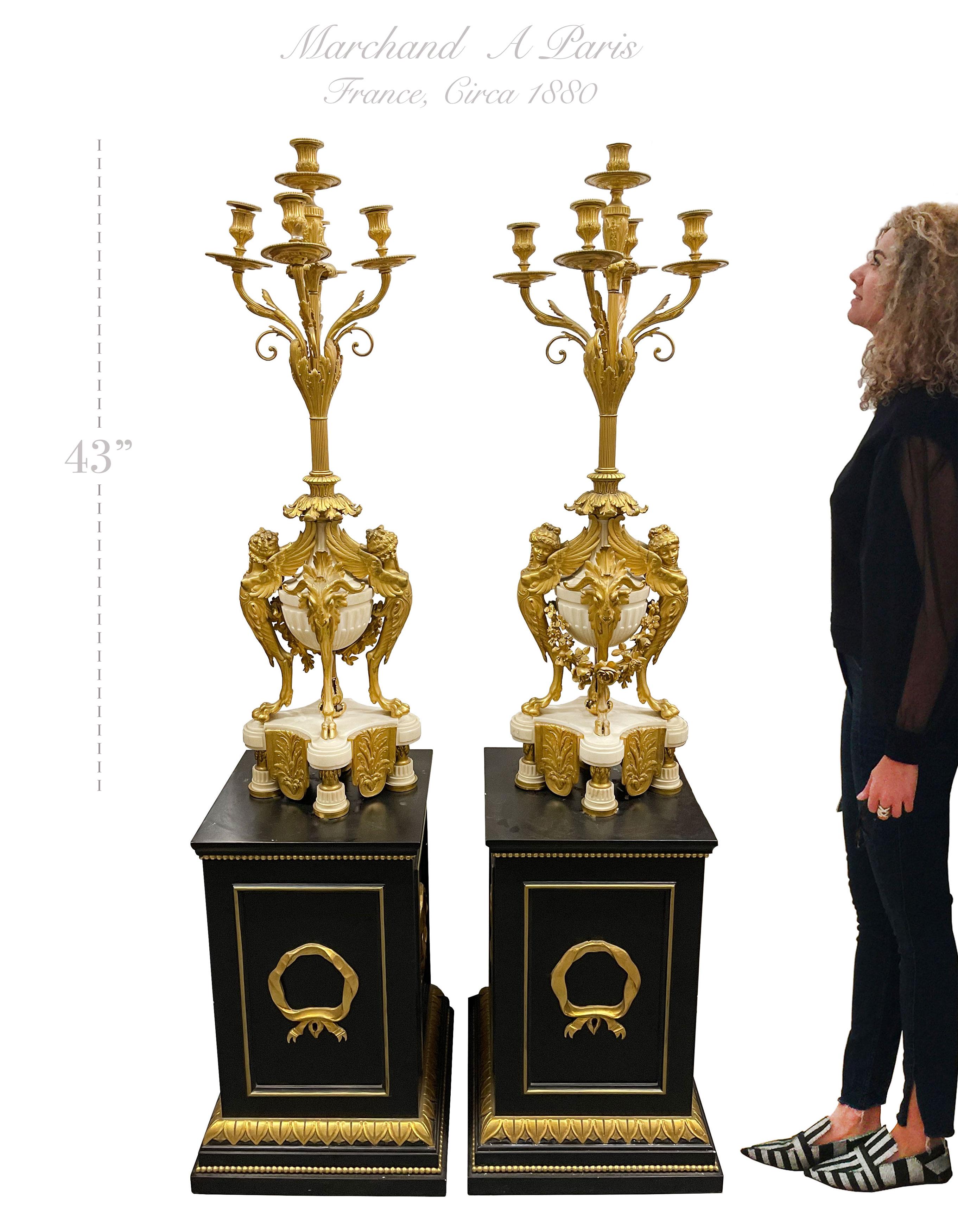 A pair of French ormolu & white marble candelabras by Marchand à Paris, Circa 1880

Note: The stands are not included.

Measure: H: 44