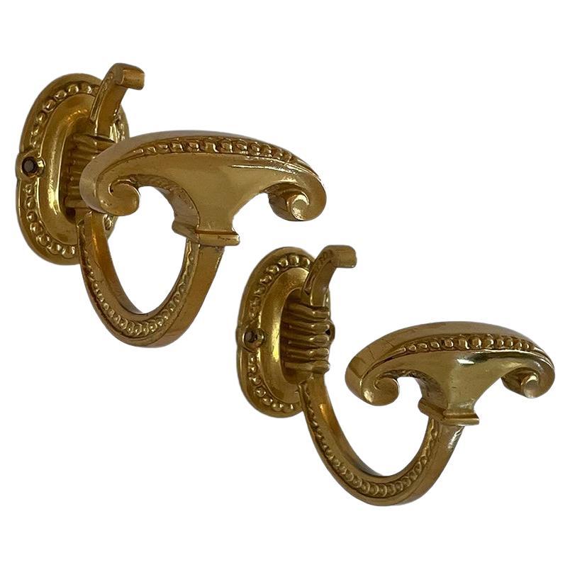 Pair of French Ornamental Brass Wall Hooks For Sale