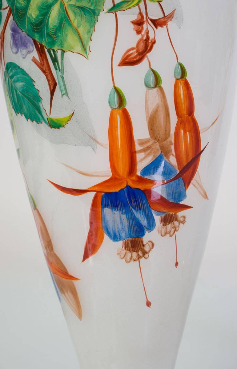 The vases painted with gilded banding, colorful birds and botanicals, last quarter of the 19th century.
