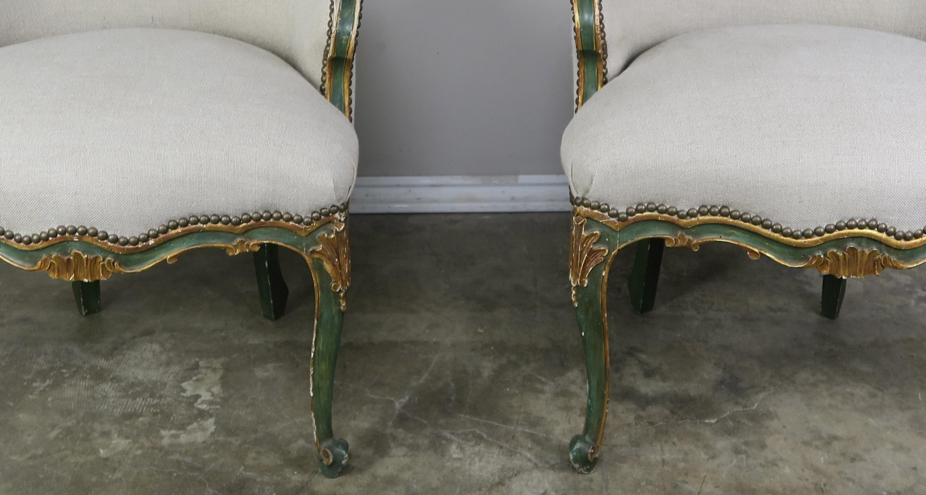 Hand-Painted Pair of French Painted and Parcel Gilt Armchairs
