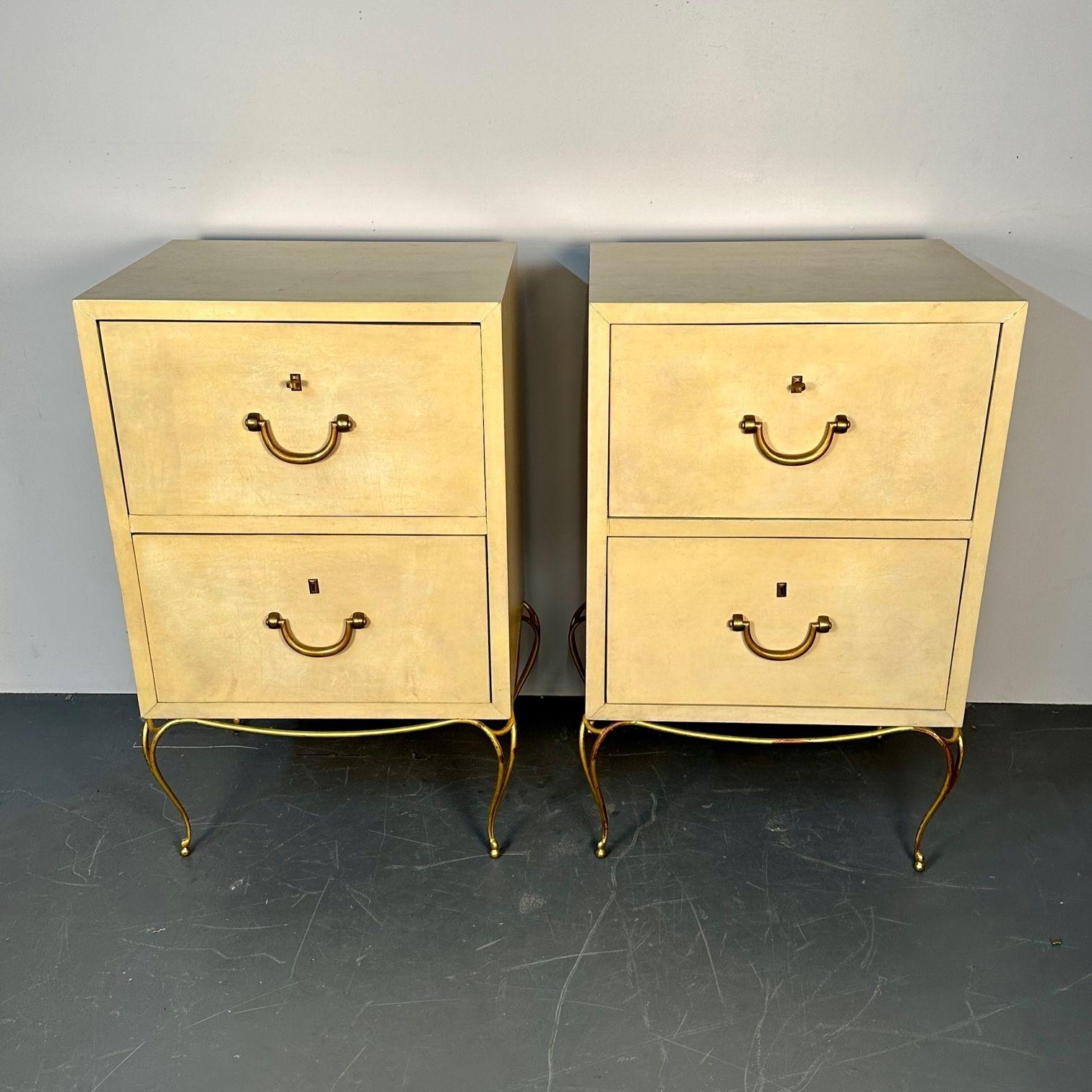 Pair Large Mid-Century French Parchment Commodes, Chests or Cabinets, 1950s
 
 A large and impressive pair of commodes or cabinets dating from the 1950s. The swirl and curved gilt metal base supporting a pair of large 15 inch deep drawers with heavy