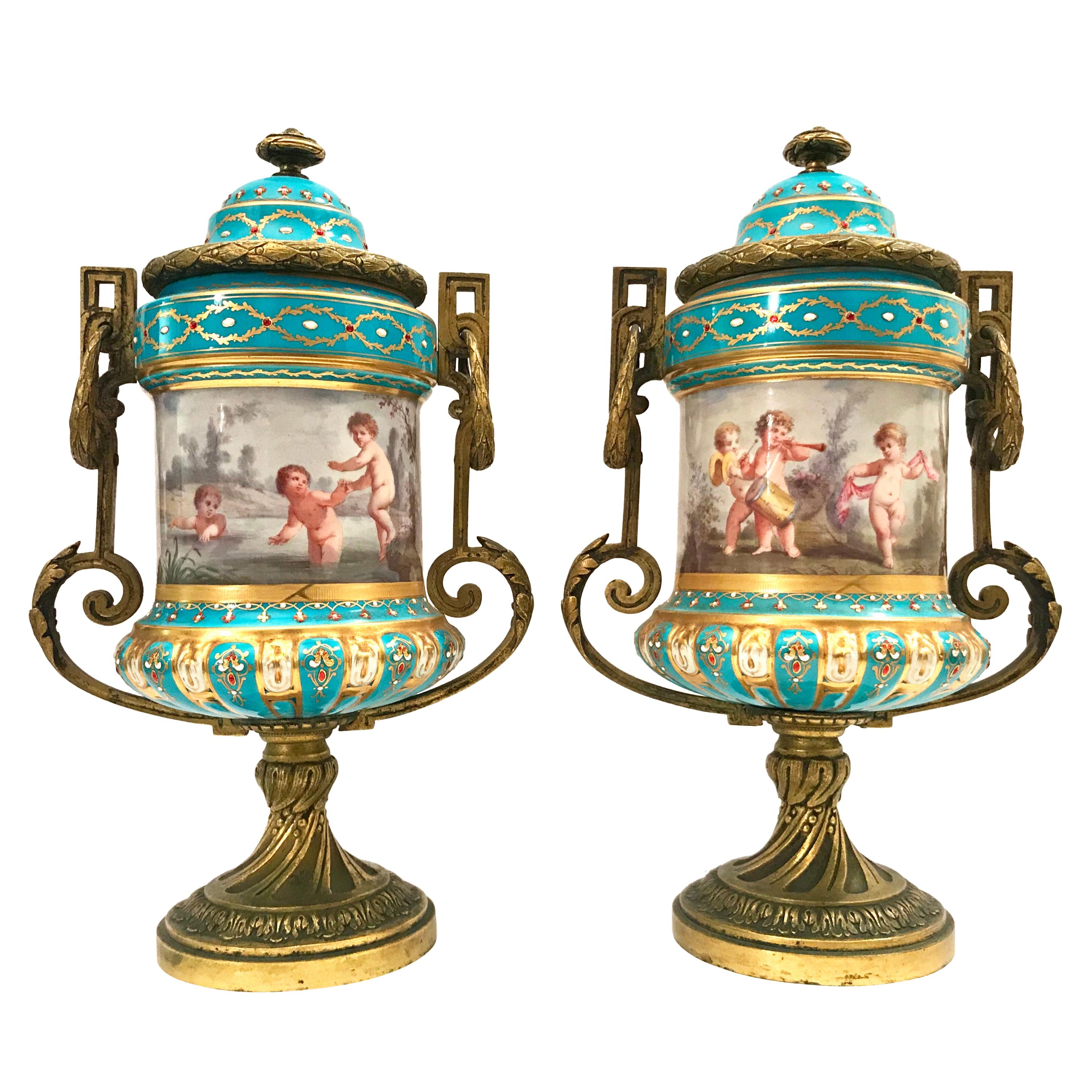 Pair of French Gilt Bronze Mounted Porcelain Lidded Urns For Sale