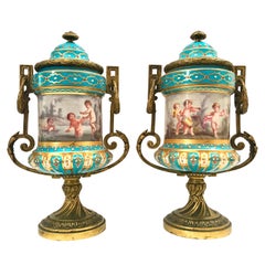 Pair of French Gilt Bronze Mounted Porcelain Lidded Urns