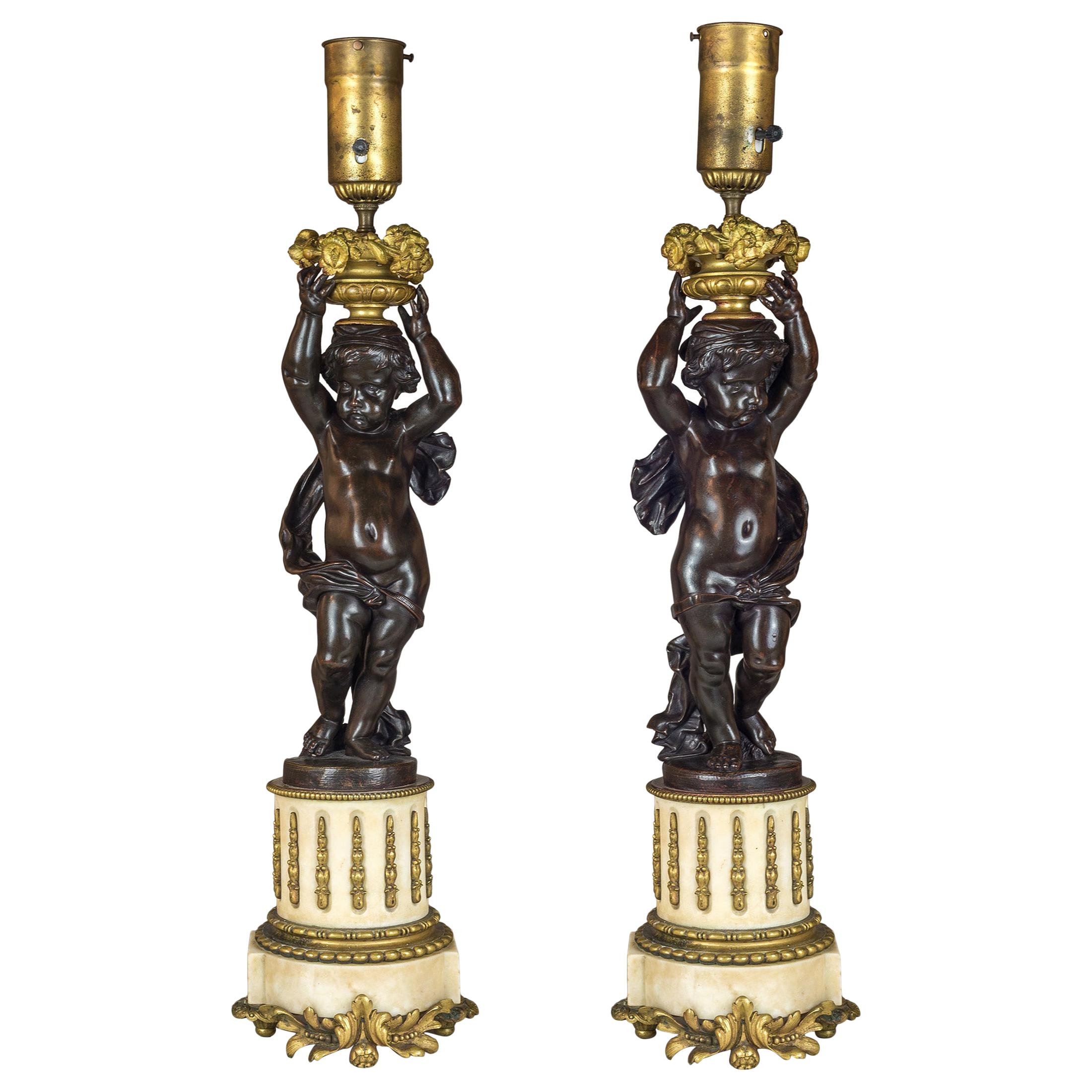 Pair of French Patinated Bronze and Gilt-Metal and Alabaster Figural Lamps