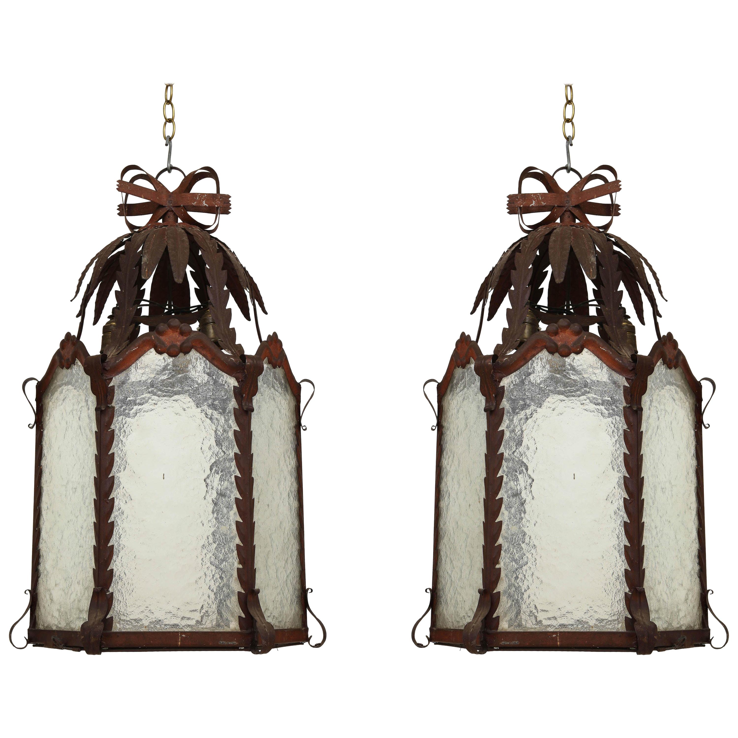 Pair of French Patinated Metal and Wavy Glass Lanterns