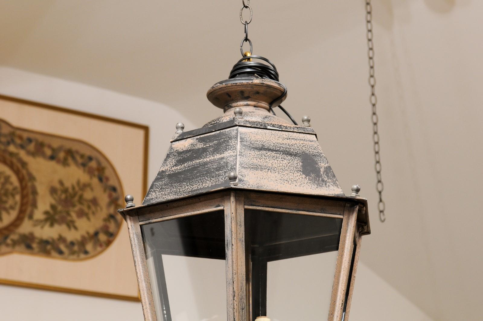 20th Century Pair of French Patinated Metal Three-Light Lanterns with Glass Panels, US Wired