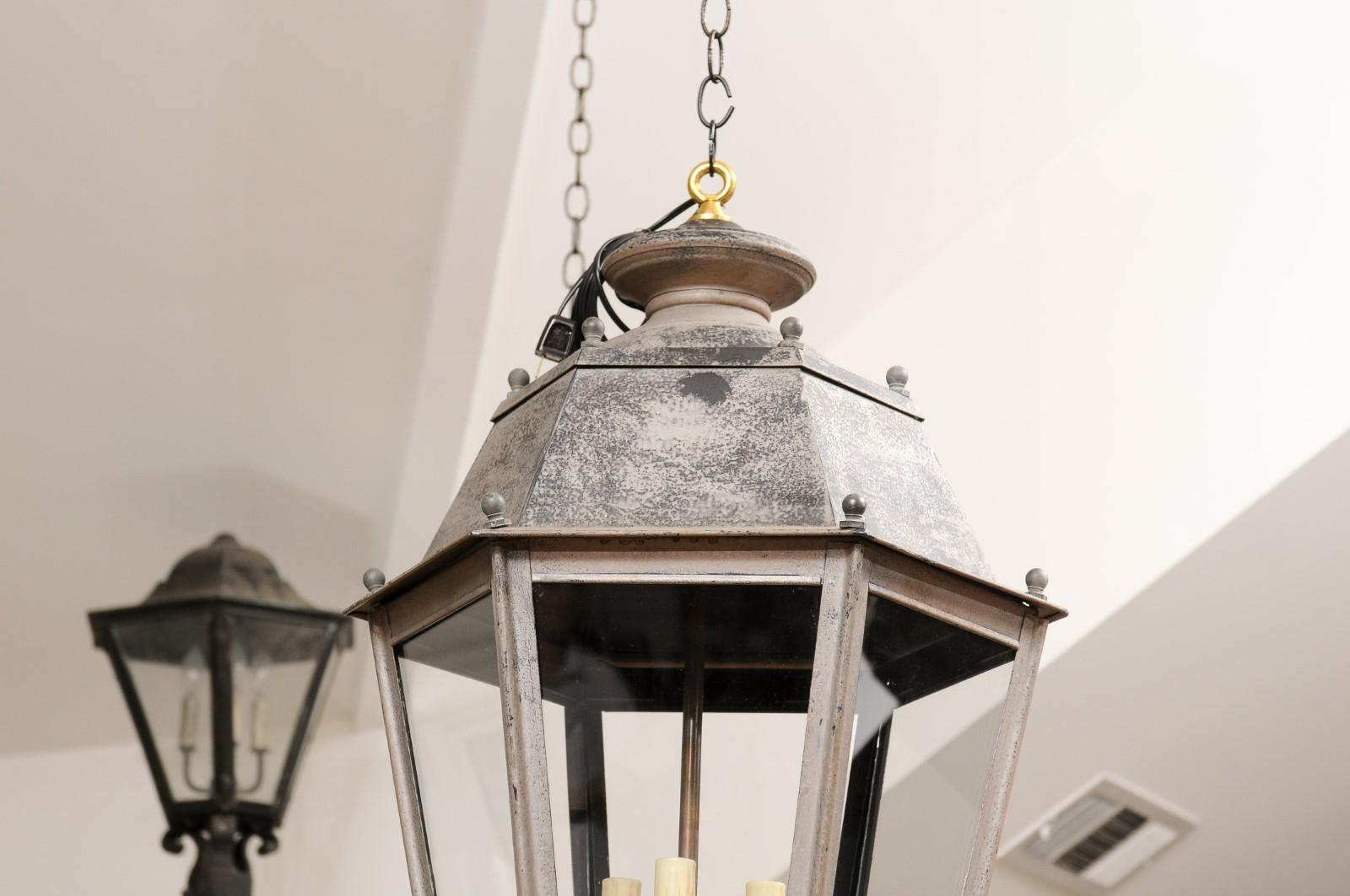 Pair of French Patinated Metal Three-Light Lanterns with Glass Panels, US Wired 3
