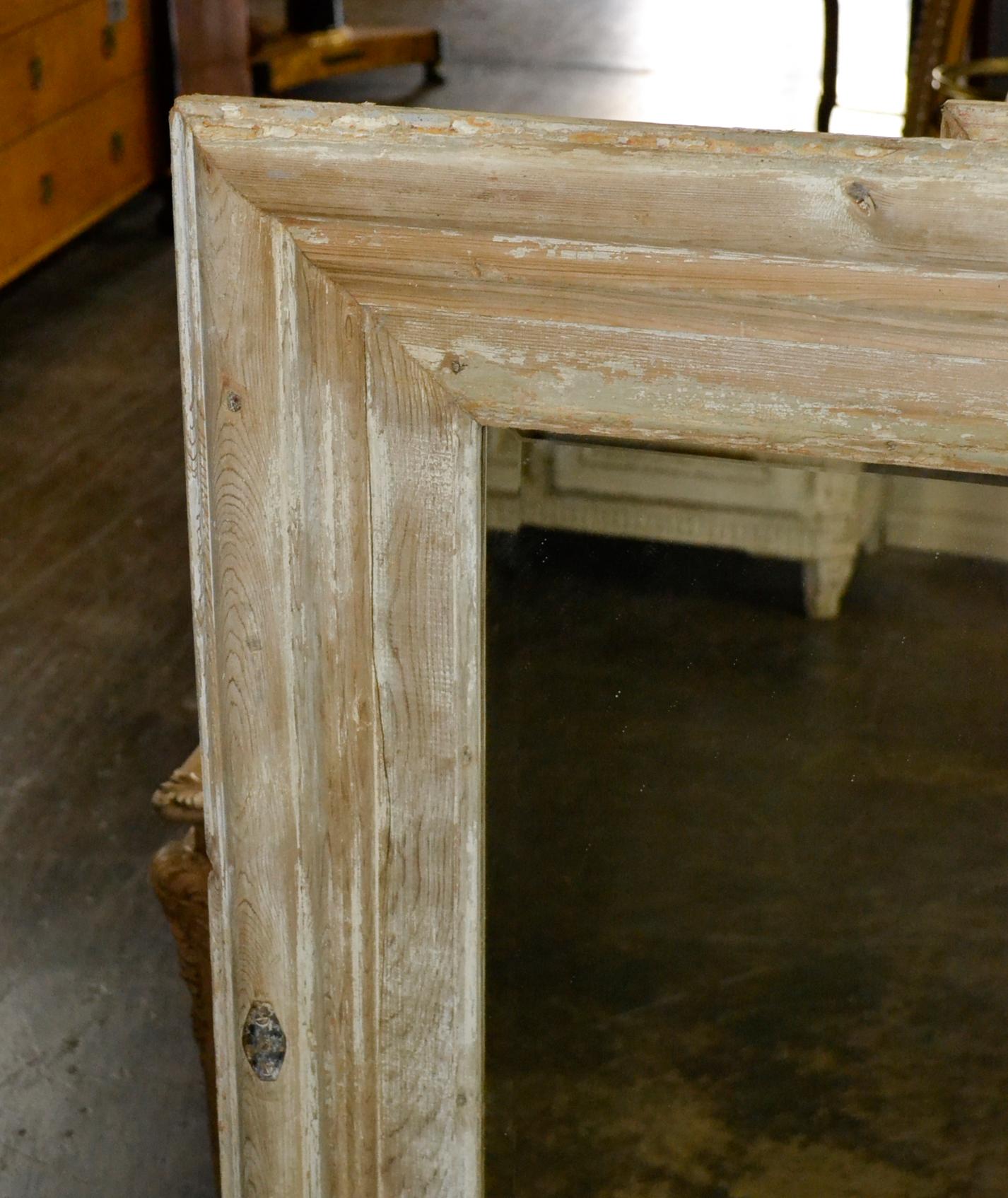 Nice pair of French pine and gesso mirrors made from antique panels.
Measures: 47.5 inches height x 35.5 inches wide x 1.5 inches deep.