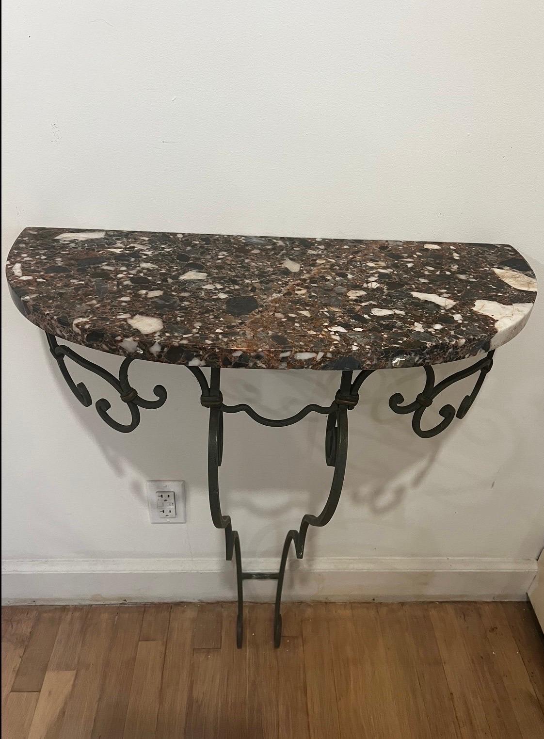 Pair of French Poillerat Style Marble Top Demi Lune Wall-Mount Console Tables In Good Condition For Sale In Los Angeles, CA