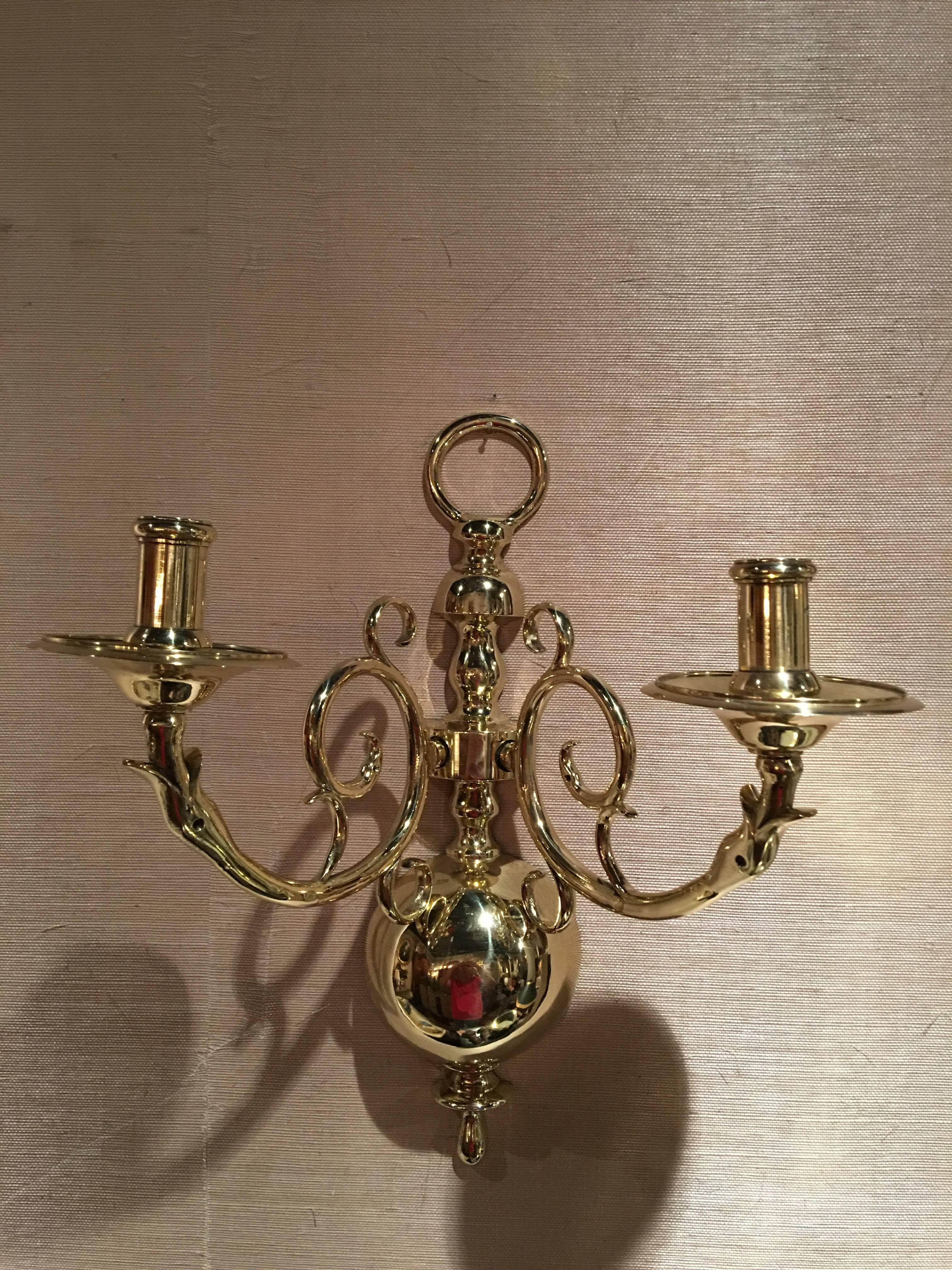Pair of French polished two candle brass sconces, 19th century. Sconces can be electrified at no additional charge.