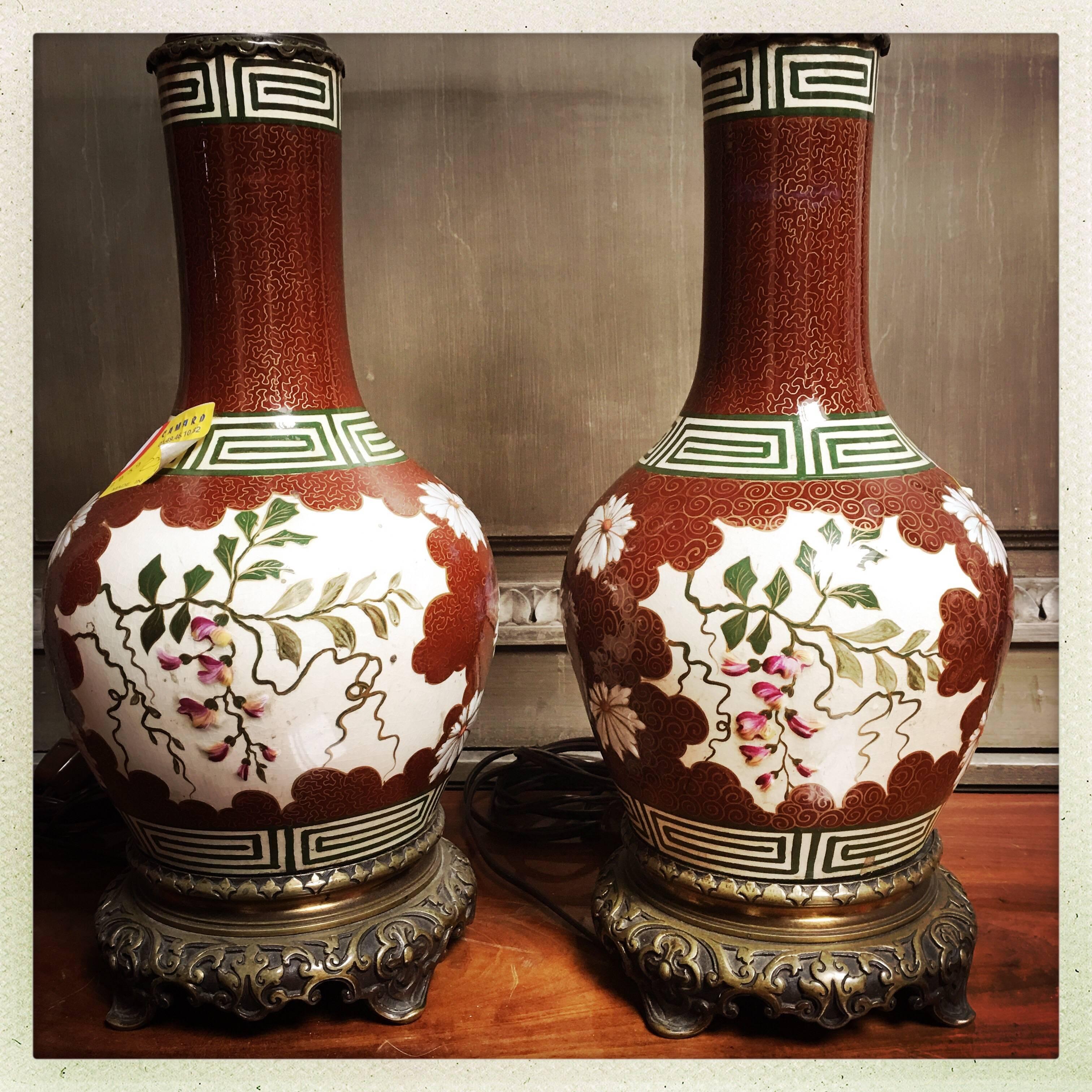 A pair of French enameled porcelain and bronze Belle Epoque lamp bases.