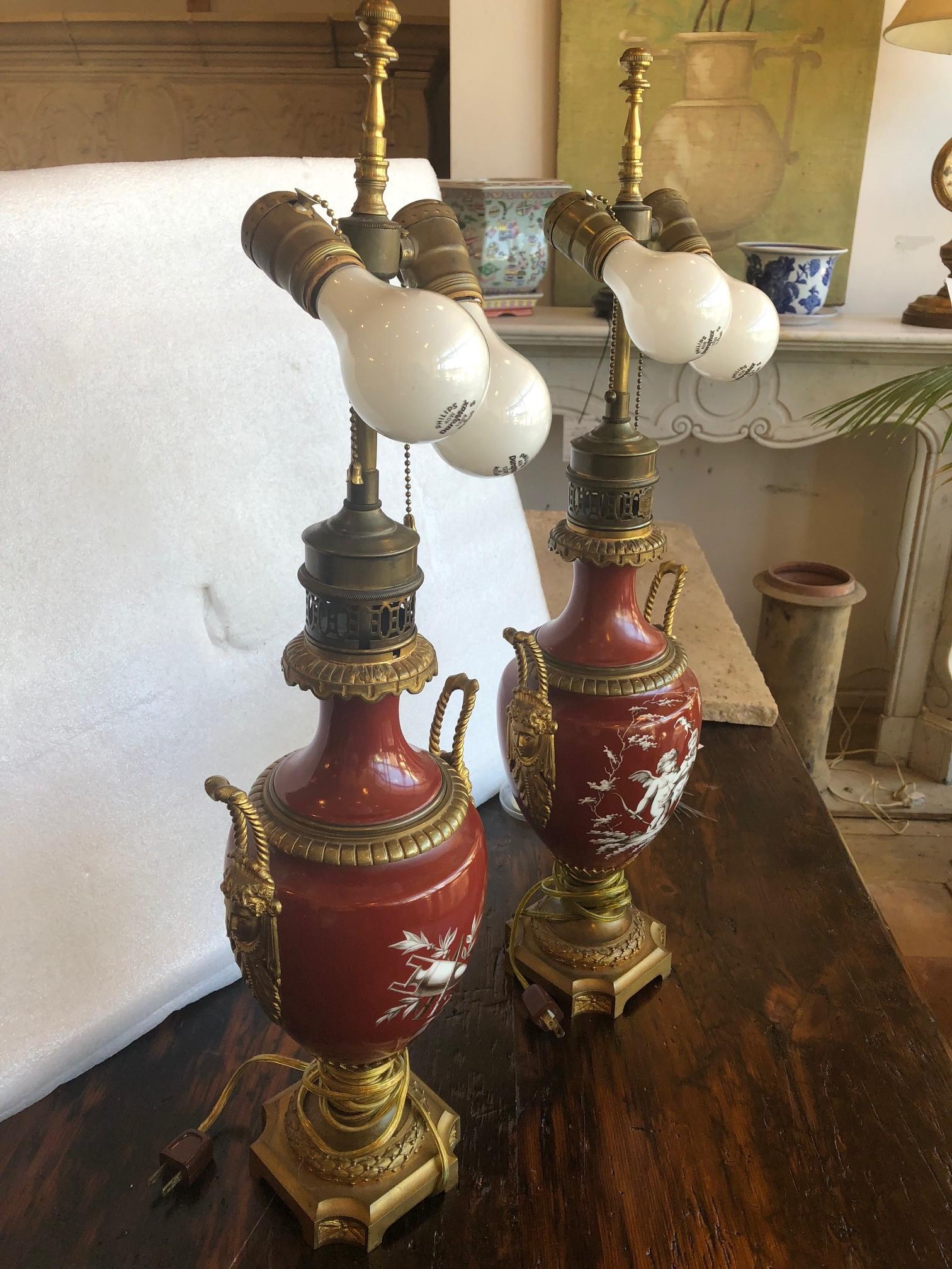 Carved Pair of French, Porcelain and Bronze Lamps For Sale