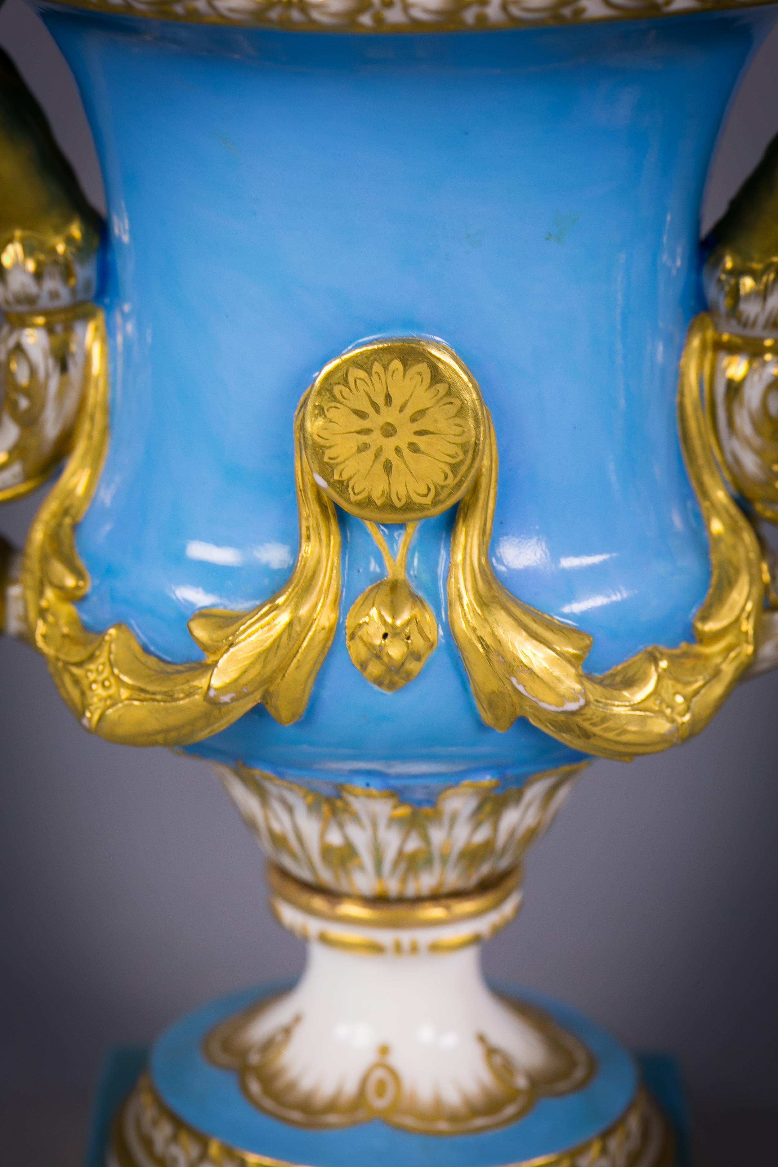 Pair of French Porcelain Gilt and Sky Blue Covered Urns, Sevres, circa 1860 In Excellent Condition For Sale In New York, NY