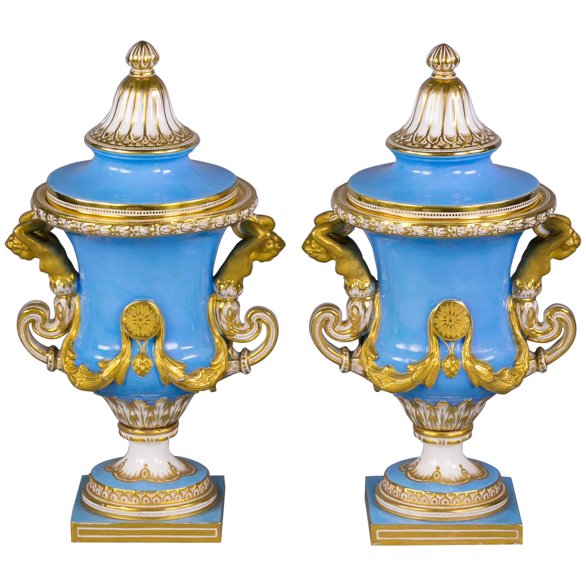 Pair of French Porcelain Gilt and Sky Blue Covered Urns, Sevres, circa 1860 For Sale