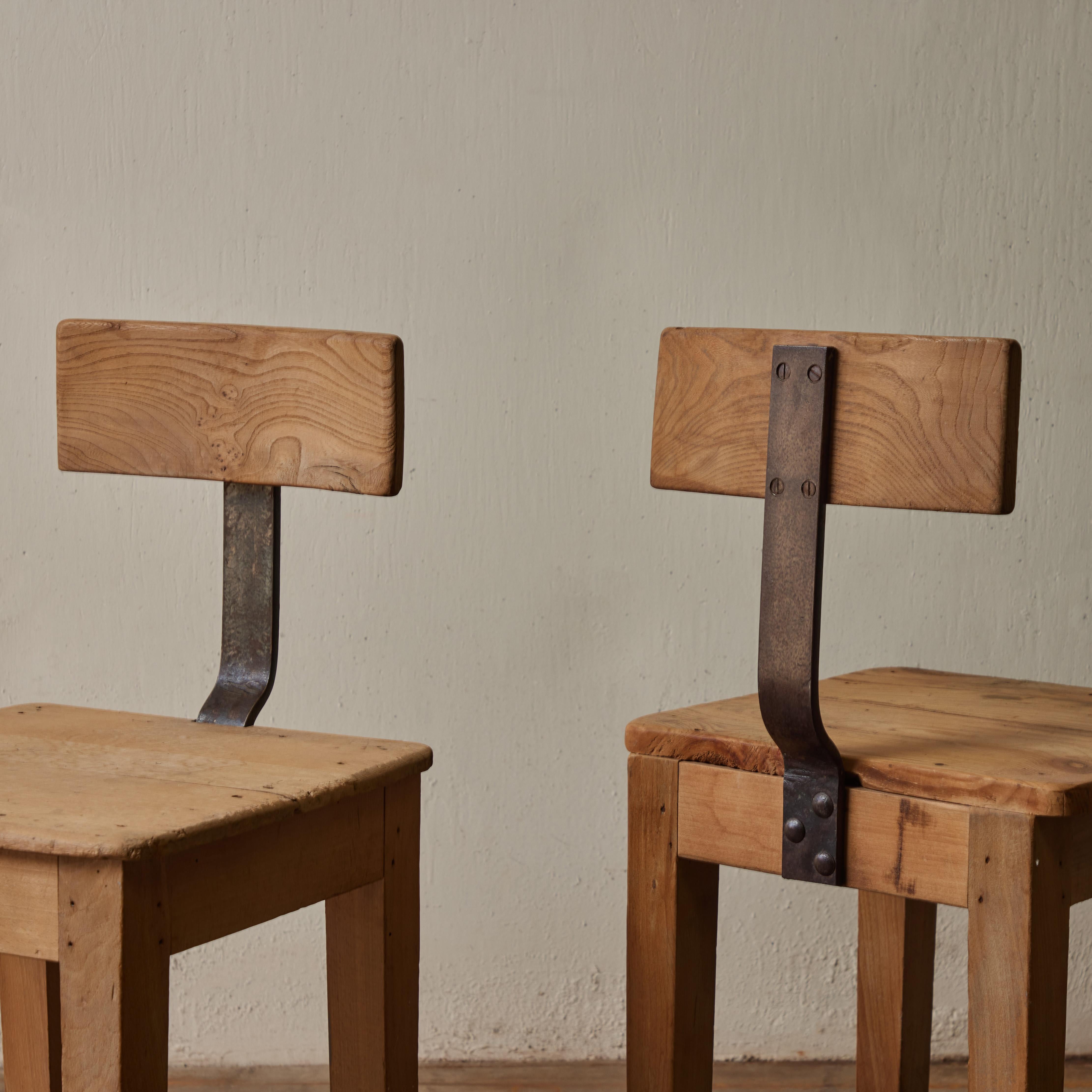 Pair of French Primitive Wood and Metal Industrial Chairs 1