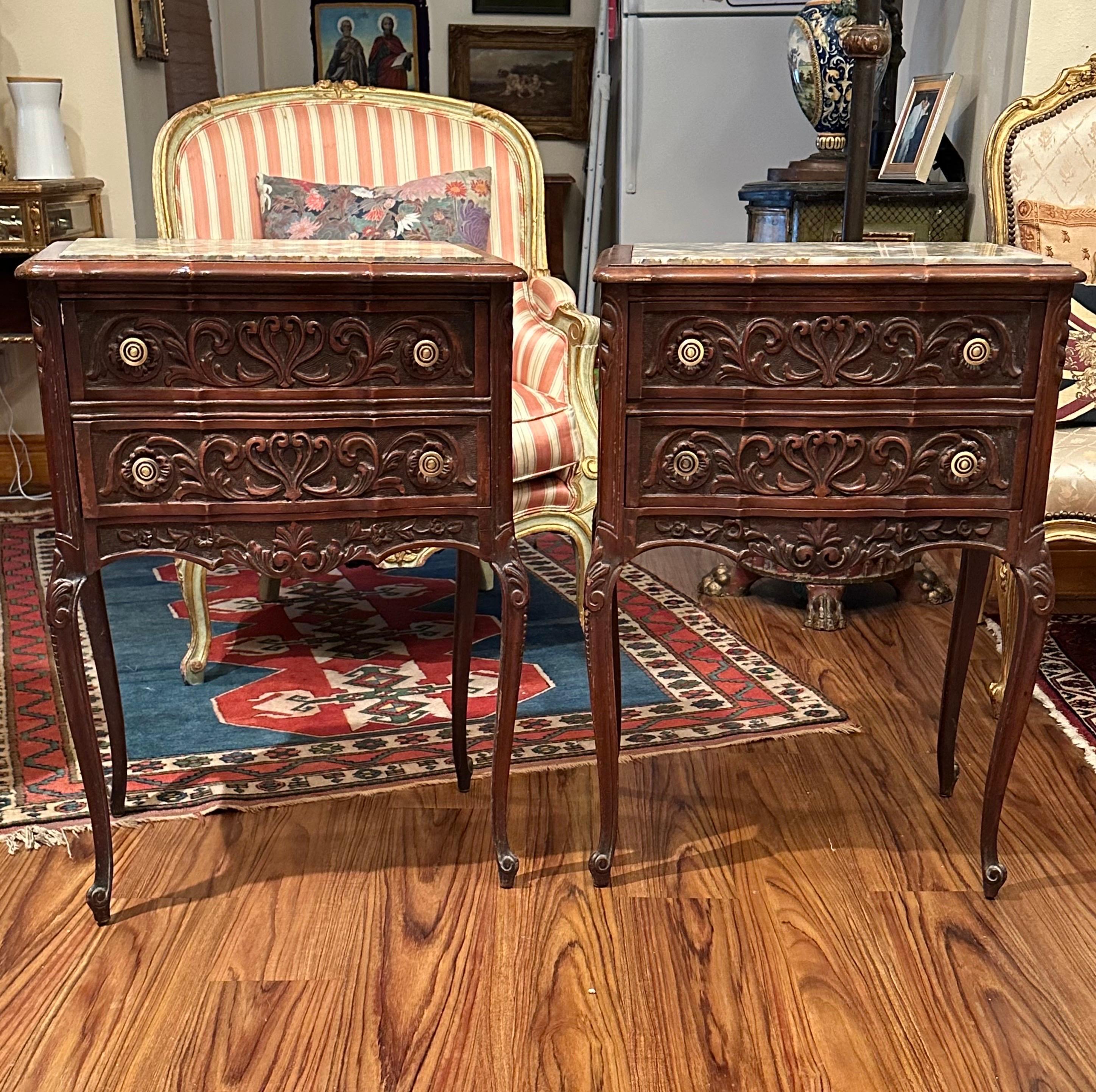 Carved Pair of French Provincial Antique Marble Top Walnut Commodes. For Sale