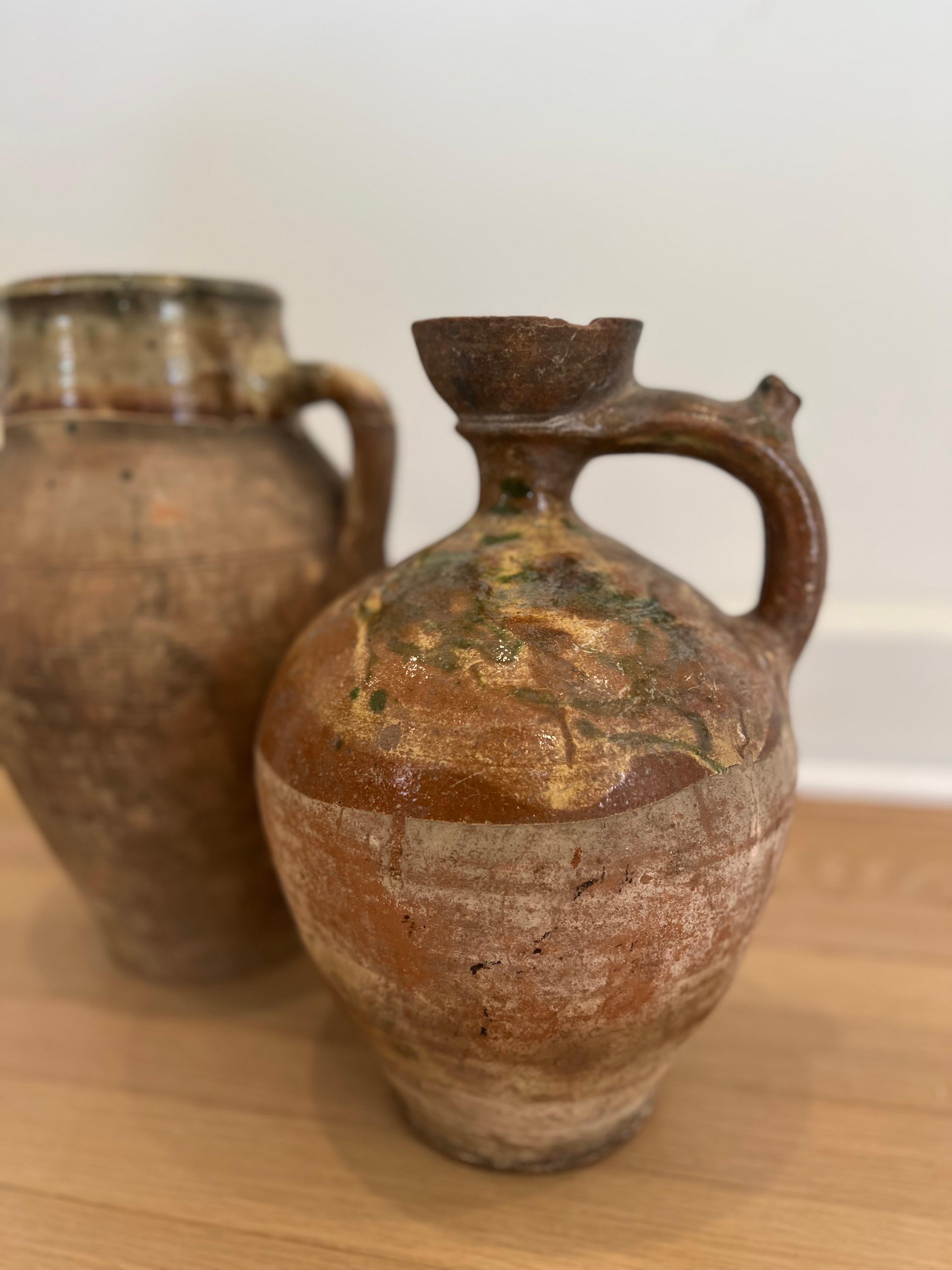 Pair of French Provincial Clay Amphora Pottery/Urns In Fair Condition For Sale In Los Angeles, CA