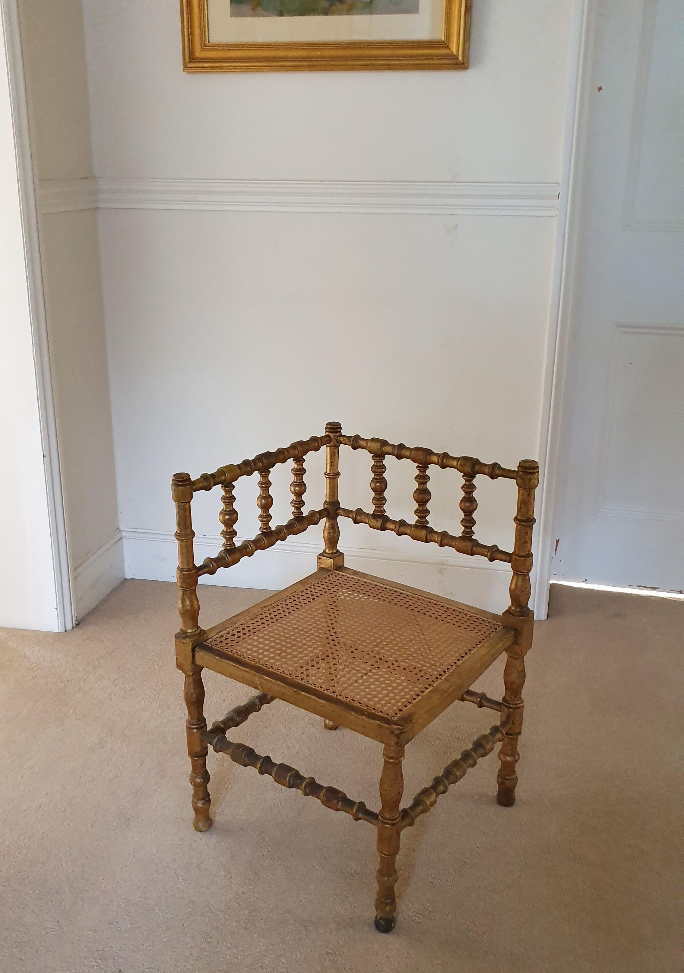Hand-Carved Pair of French Provincial Gilded Hand Carved Bobbin Chairs with Woven Cane Seats For Sale