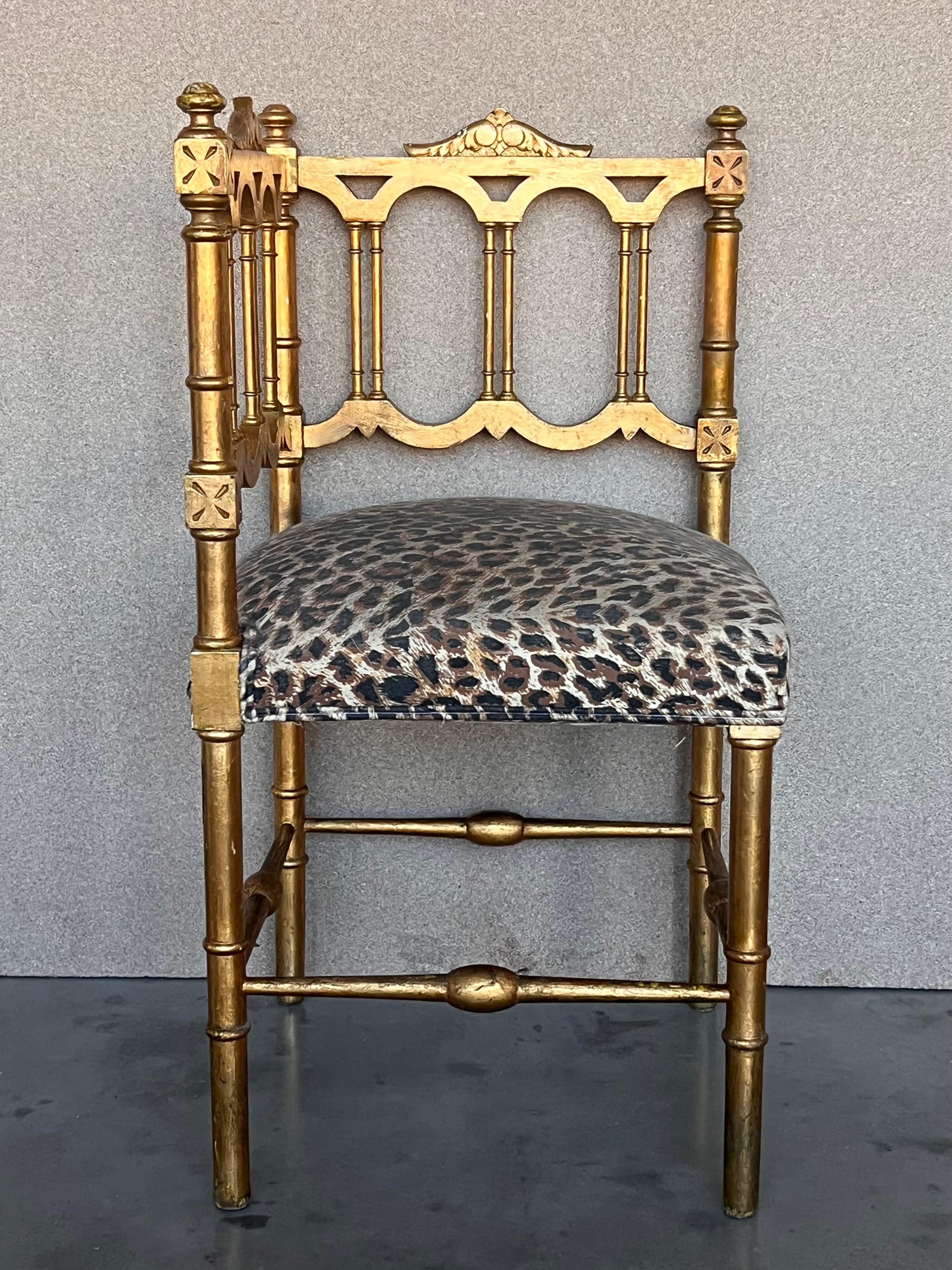 A charming pair of French Provincial gilded wood corner chairs. Beautifully carved walnut frames and new upholtered seats, sturdy and strong and in good antique condition. Stylish, eye-catching chairs would make a fabulous addition to any eclectic