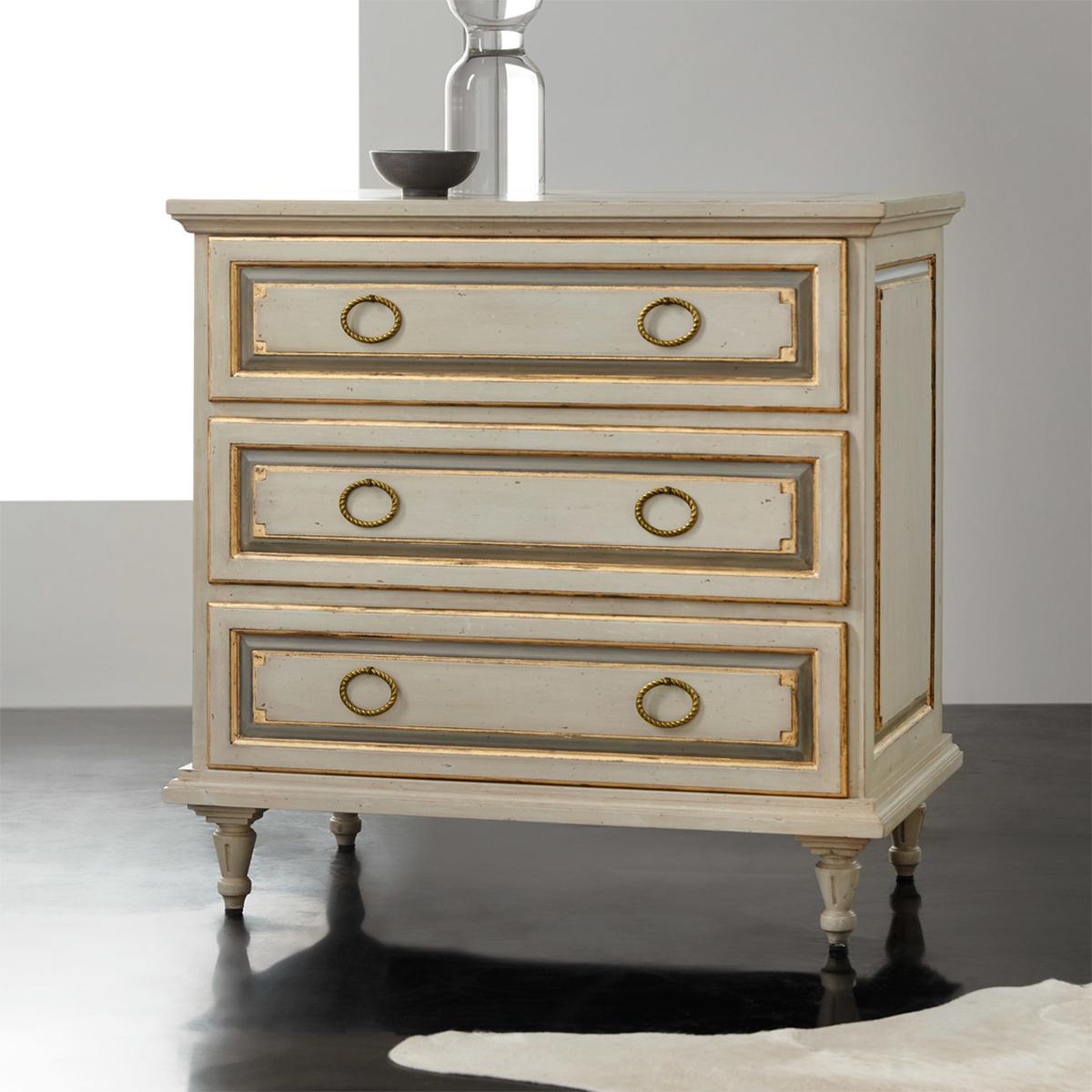 Pair of French Provincial Painted Nightstands. This French Directoire style provincial bedside commode has an antiqued hand-painted finish with a rectangular molded top above three long paneled drawers with gilded trim, with paneled sides also with