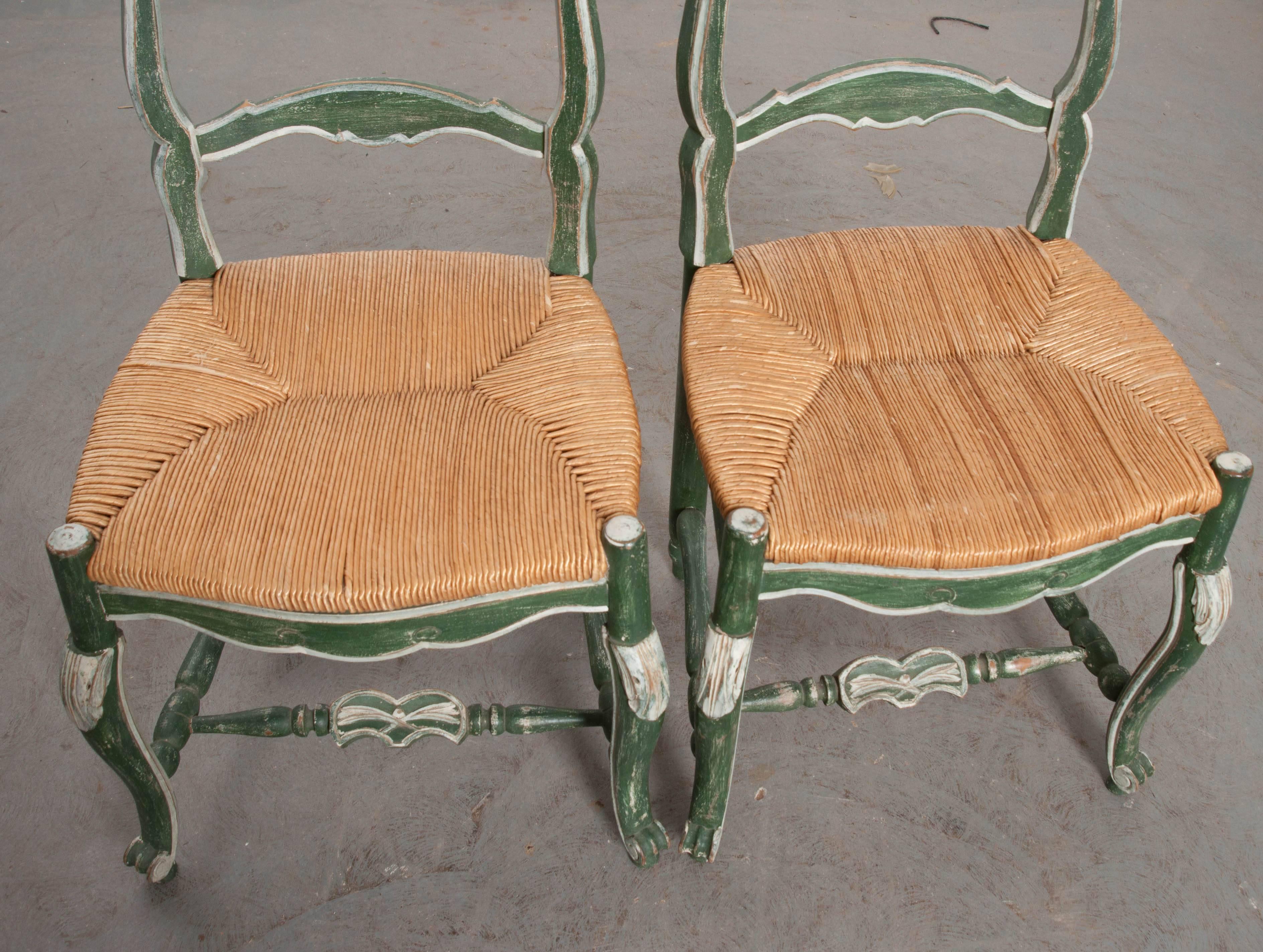 Carved Pair of French Provincial Painted Rush Seat Chairs