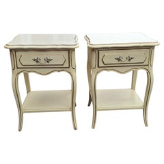 Pair of French Provincial Style Cream Painted and Partial Gilt Nightstands