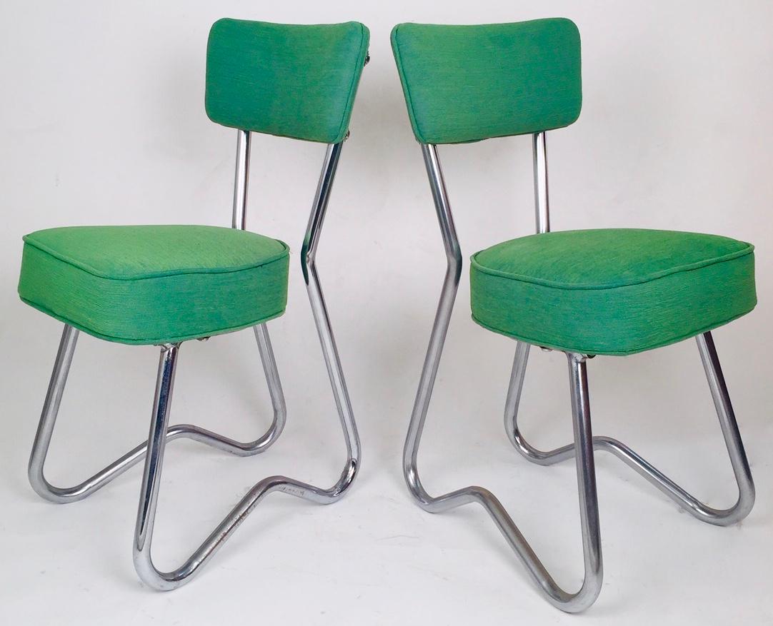 A pair of French rationalistic tubular chairs. Chromed steel. Reupholstered in IKvadrat wood.Stamped 