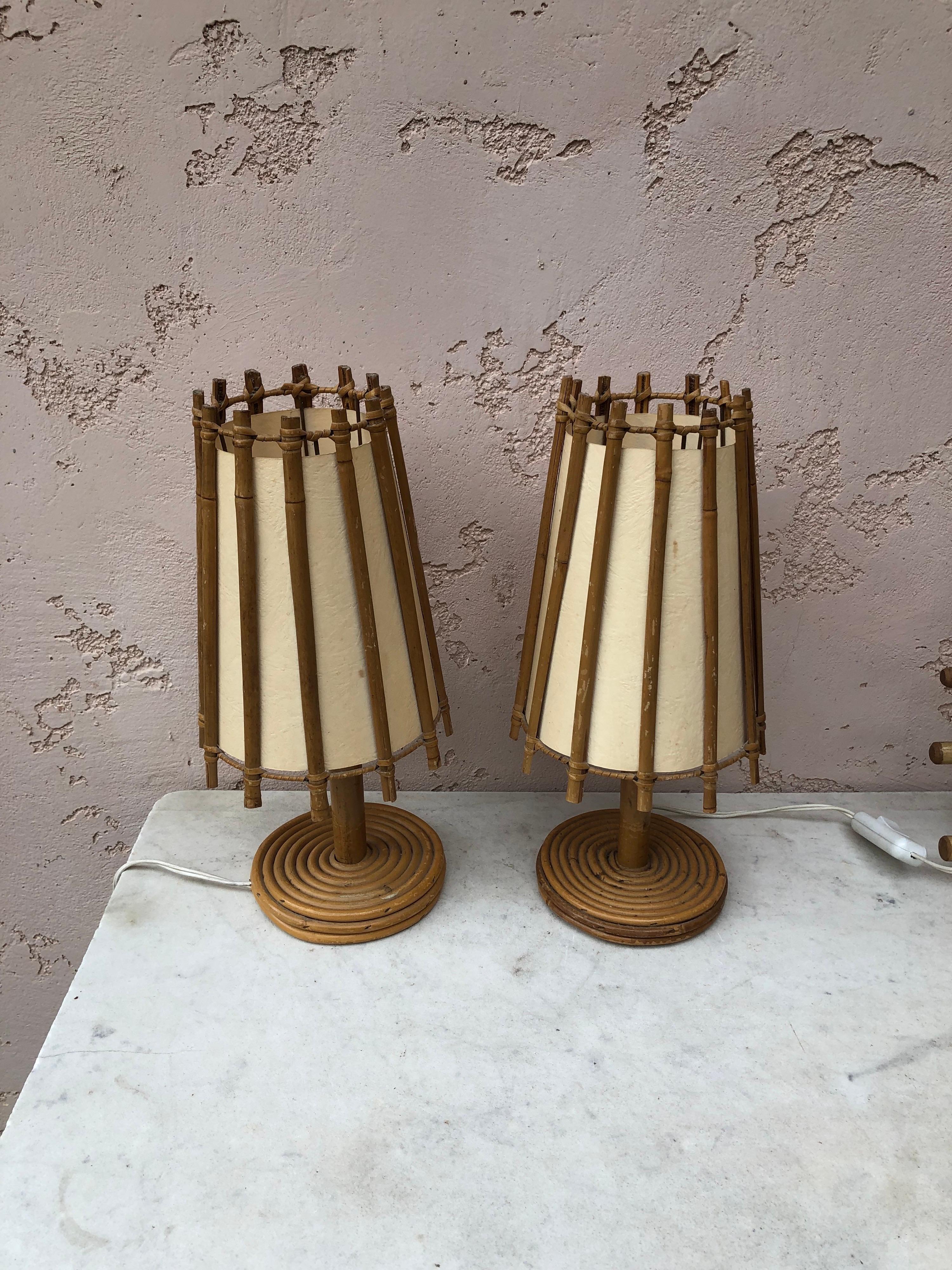 Pair of French rattan lamps Louis Sognot, circa 1950.
Measures: height / 13.5 inches.
Diameter / 6.5 inches.