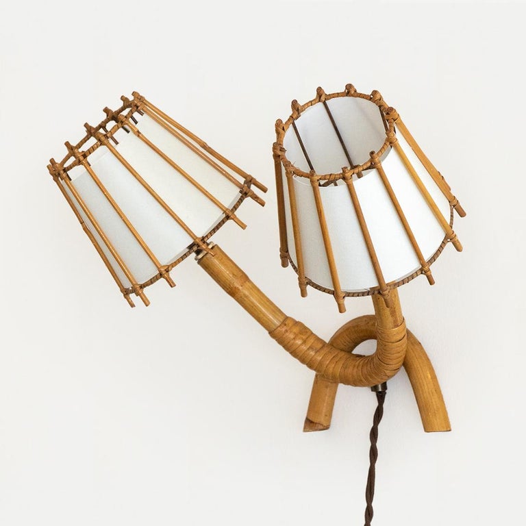 Mid-Century Modern French Rattan Sconce by Louis Sognot For Sale