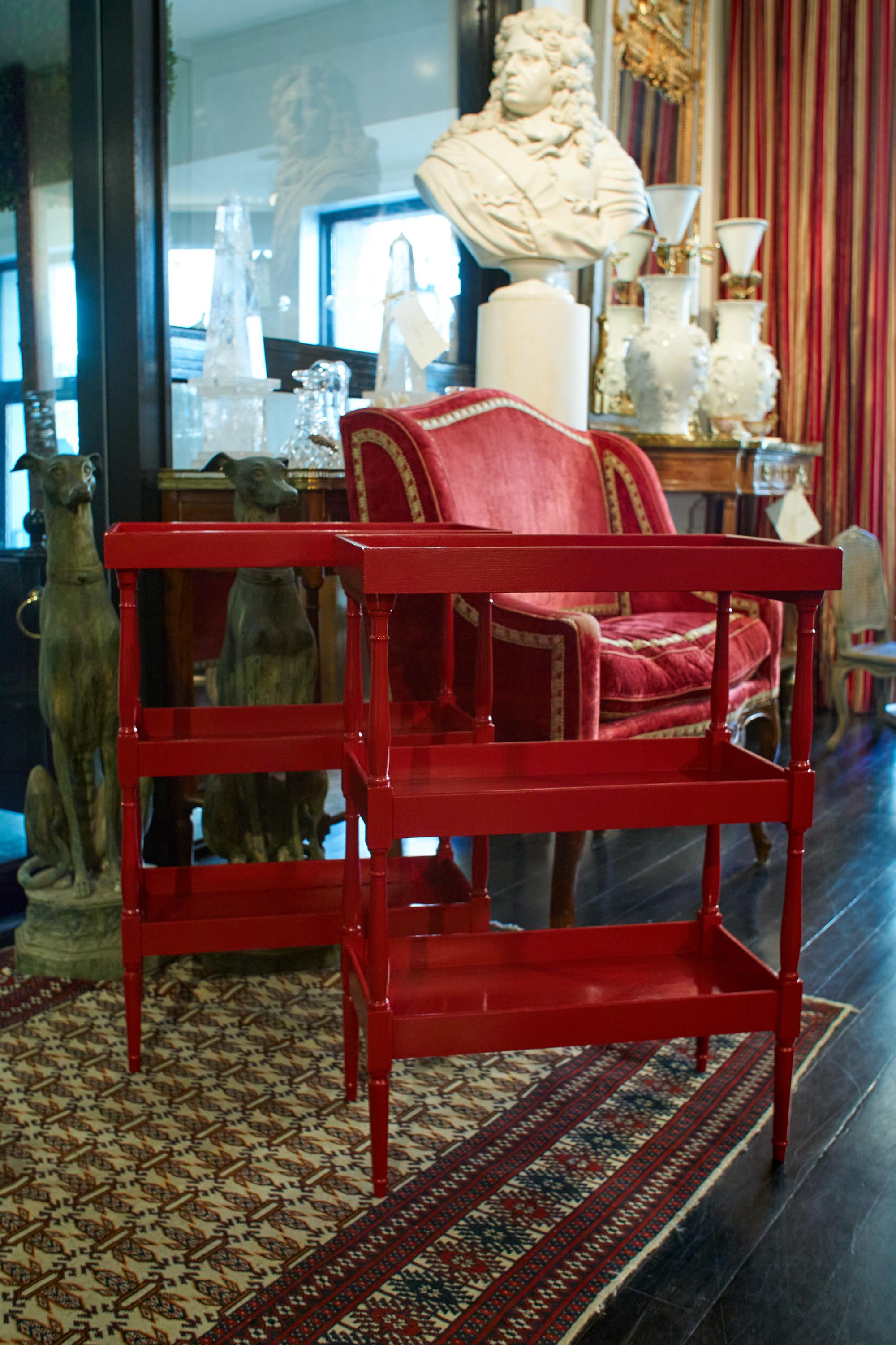 French three-tiered tray table, turned legs, each tier in tray form. Beautiful deep red colour of the lacquer. Mid-Century Modern, inspired by the chic Maison Jansen estheric.