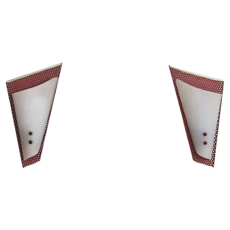 Pair of French Red Perforated Metal Sconces in the Style of Jacques Biny, 1950s For Sale