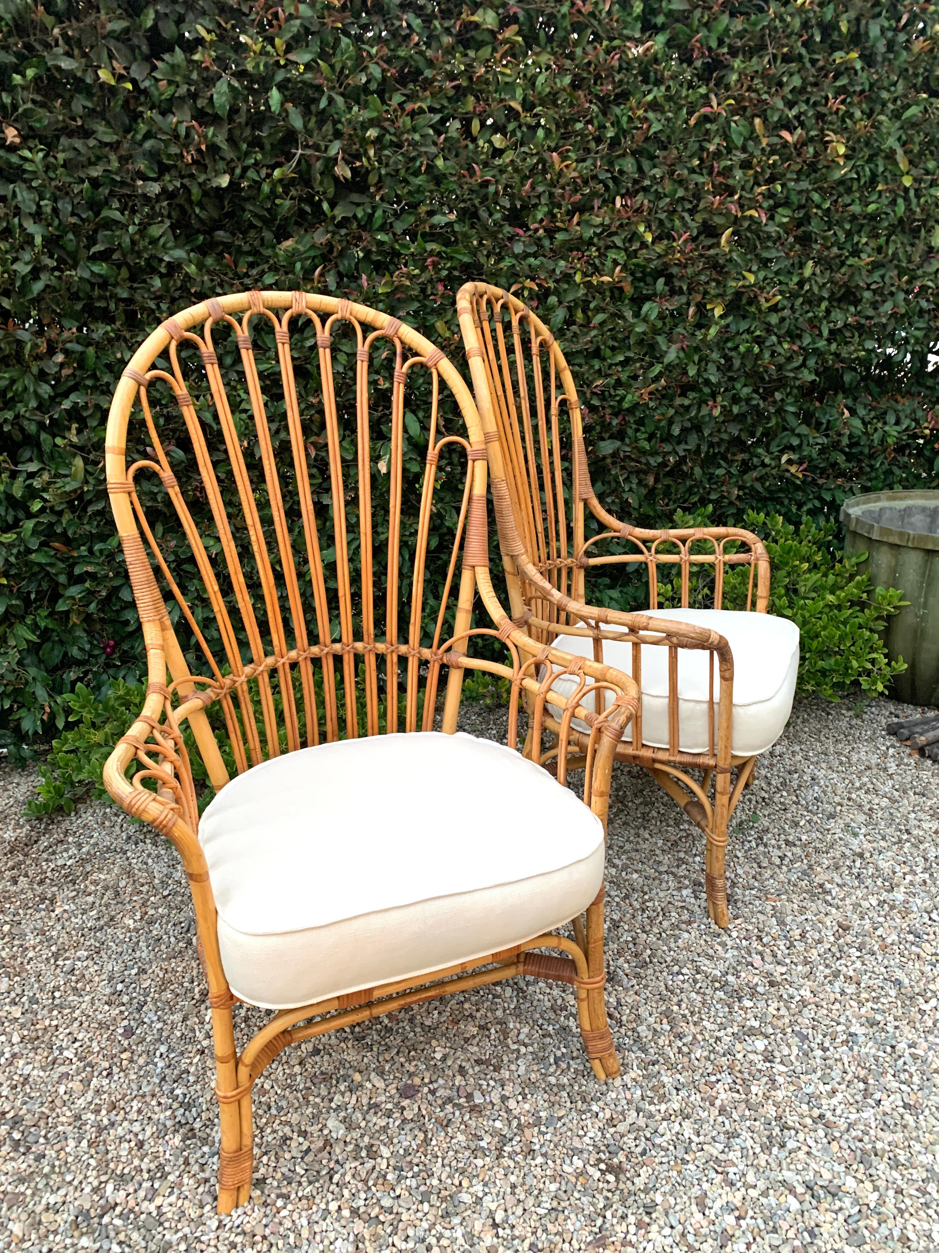 Upholstery Pair of French Reed and Bamboo Rattan Wing Chairs with Linen Cushions