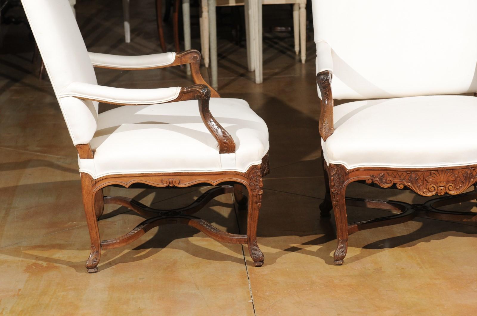 Pair of French Régence Style 19th Century Walnut Armchairs with Carved Foliage 4