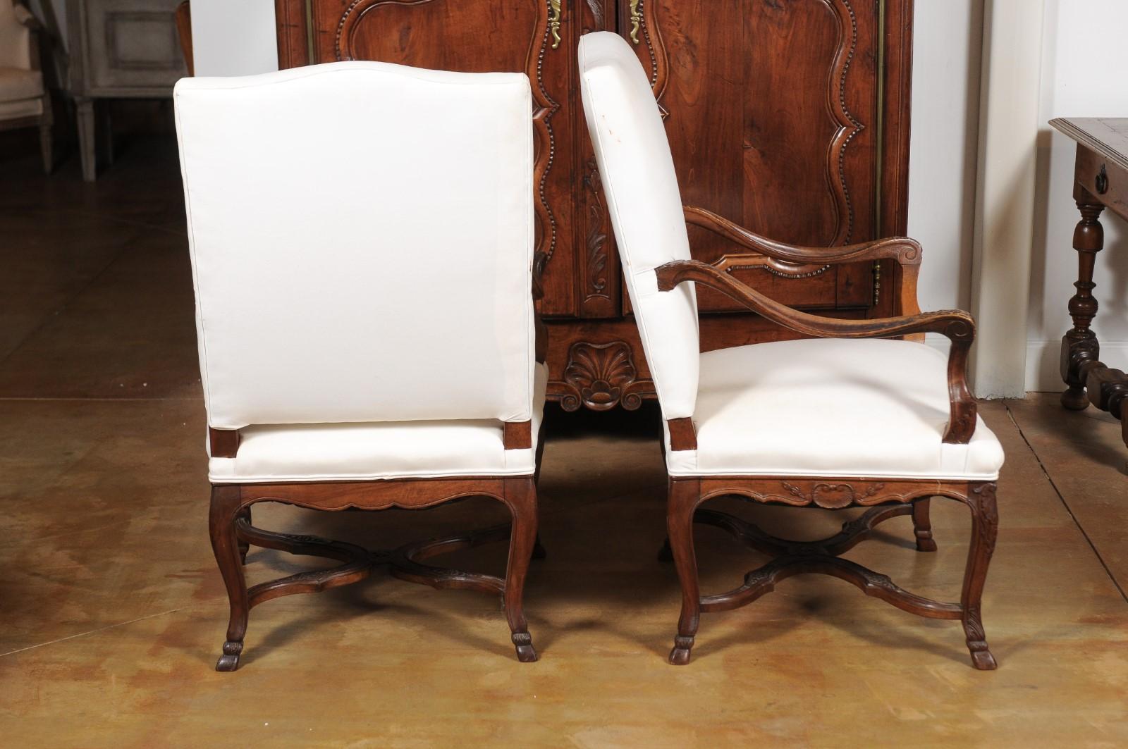 Pair of French Régence Style 19th Century Walnut Fauteuils with Carved Foliage 7
