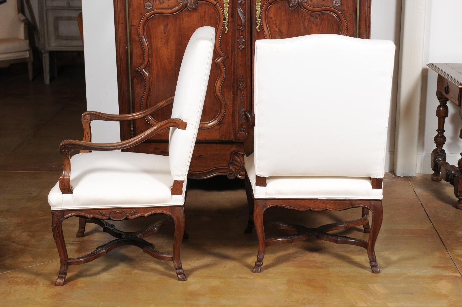 Pair of French Régence Style 19th Century Walnut Fauteuils with Carved Foliage 8