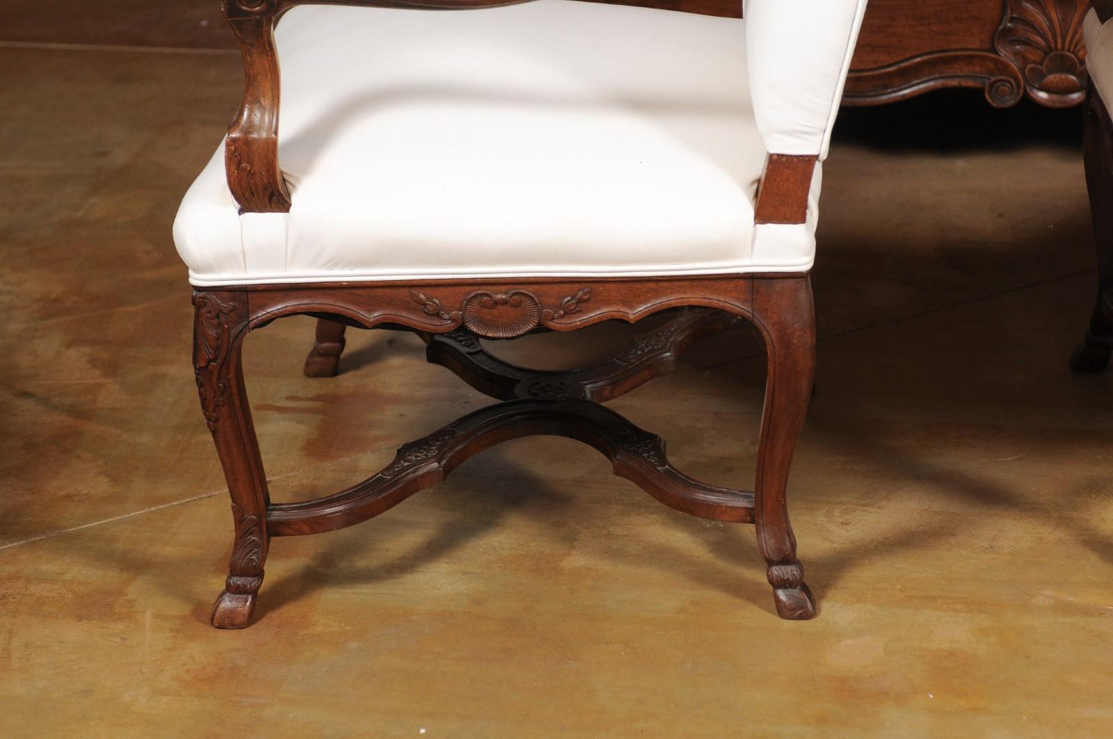 Pair of French Régence Style 19th Century Walnut Fauteuils with Carved Foliage 9