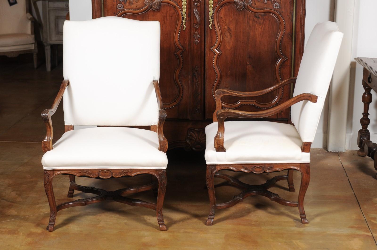 Pair of French Régence Style 19th Century Walnut Fauteuils with Carved Foliage 10